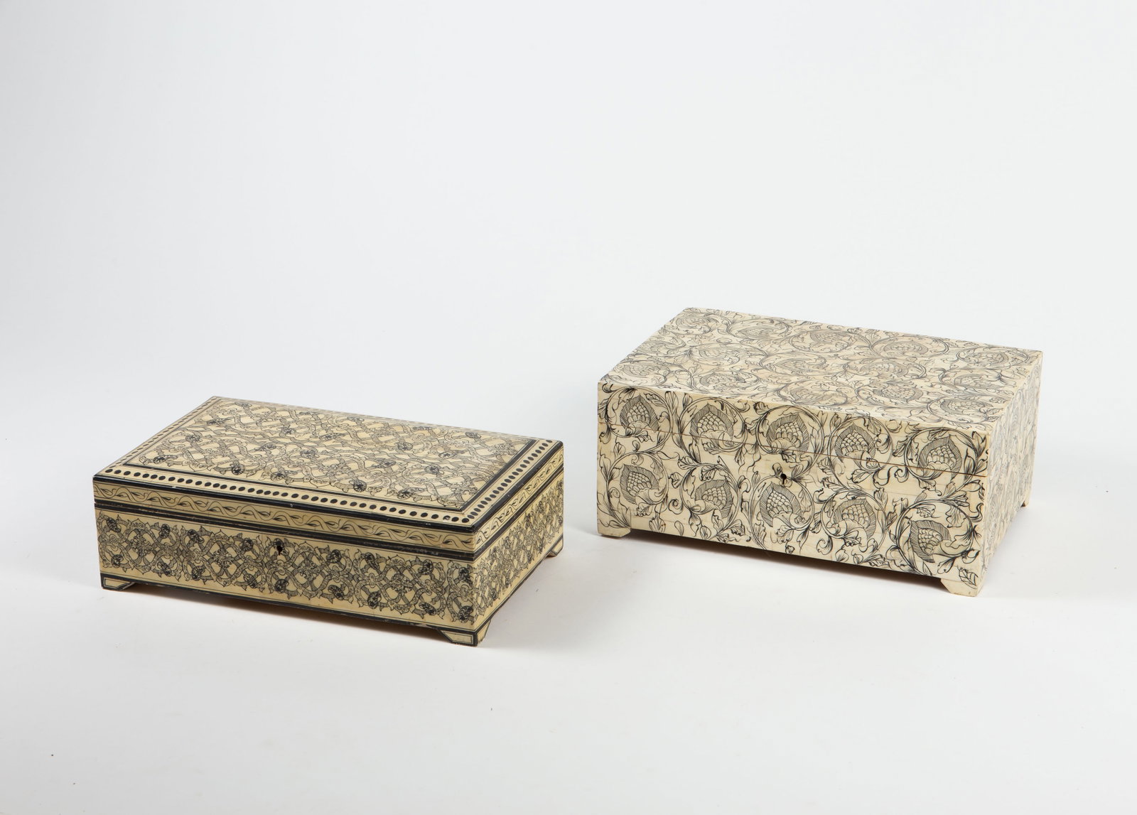 Made in India Wood Dresser Boxes w/ Painted Bone.: There are some scratches and stains present, but overall, the boxes look to be in good condition. They are made for Tozai. One measures 12 1/2" x 8 1/2" x 5 3/8"; the other measures 12 1/4" x 7 1/2"
