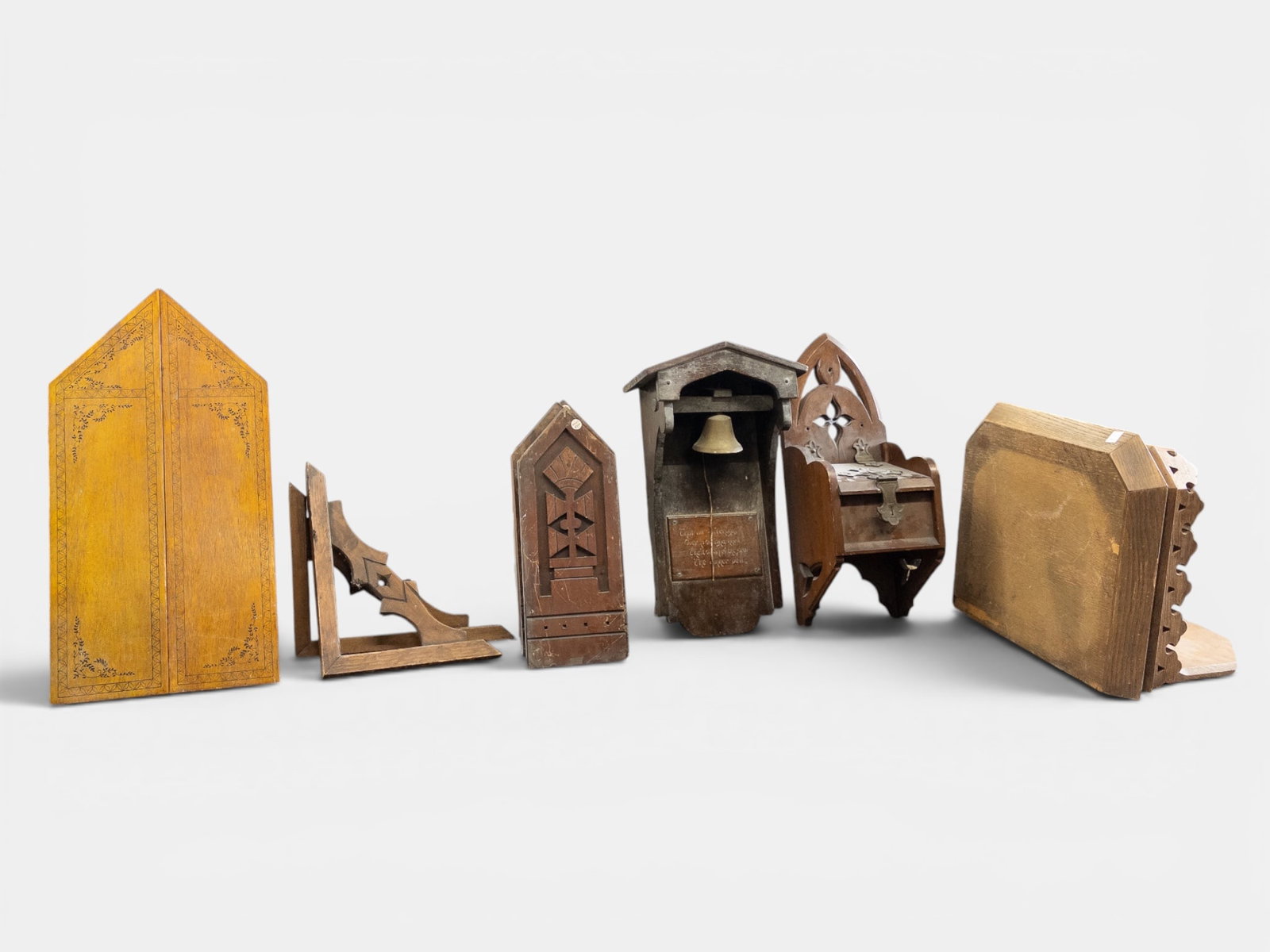 Lot of Church Items- Hymn Board, Bell, Coin Box.: This lot contains a variety of vintage wood church items: a hymn board with opening doors, a wall mounted church bell, a coin collection box, five identical carved wall panels, and more. There are