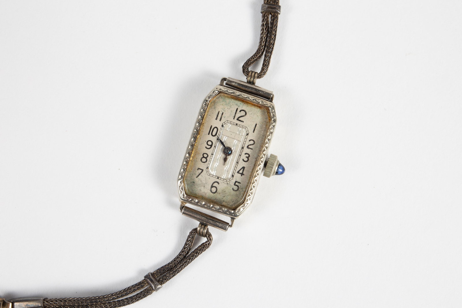 14K White Gold Art Deco Ladies' Watch.: The watch has a 14K white gold case with a white gold-filled sterling silver band. The inside of the case is marked 14K. The watch movement is marked 15 Jewels Brunvil Watch Co., along with other info