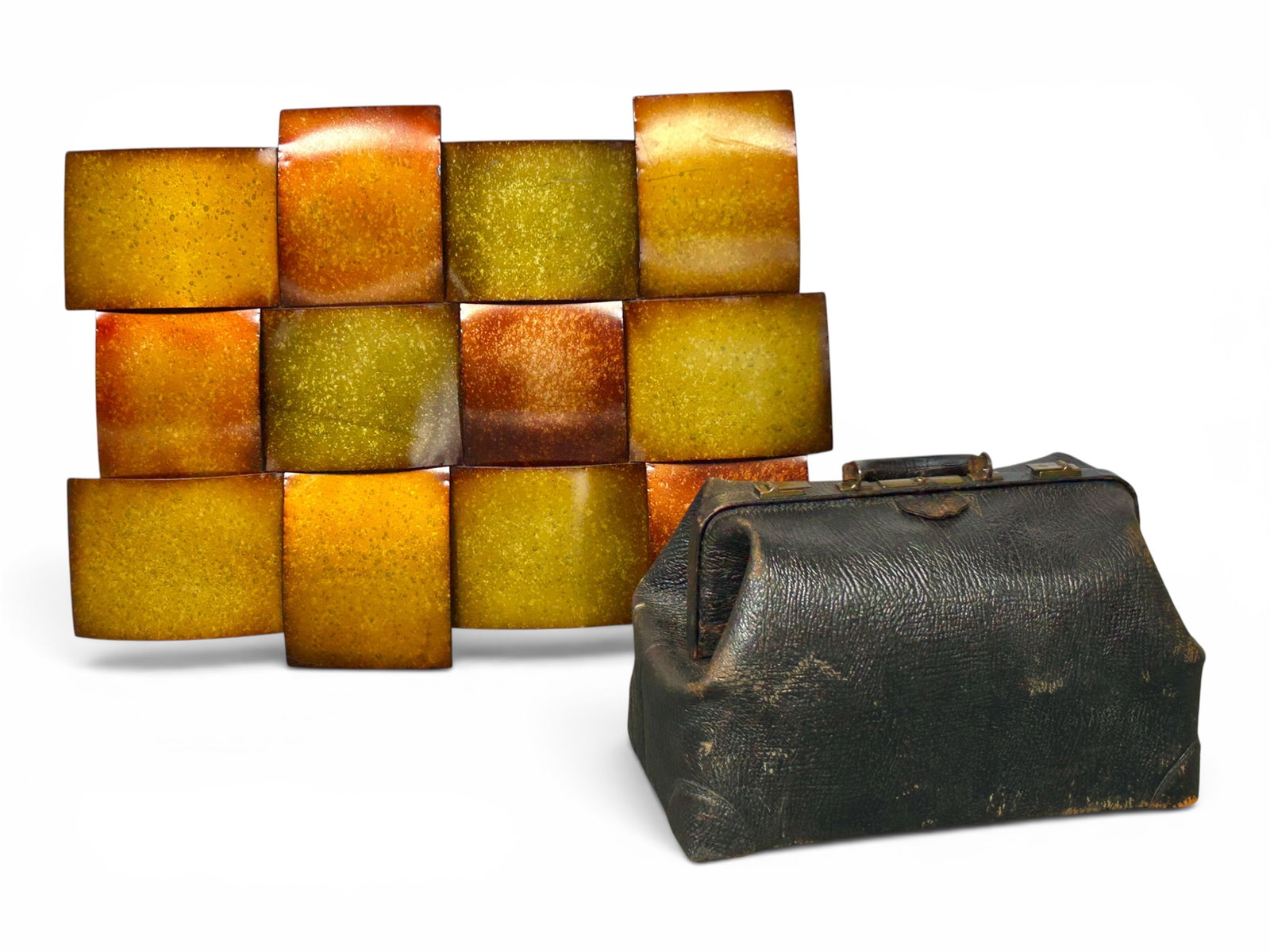 Lot: Geometric Metal Wall Sculpture & Doctor's Bag: The lot contains 2 items. There is a modern geometric metal wall hanging sculpture, and a vintage black leather doctor's bag with brass hardware which is locked shut. The sculpture measures 24 3/4" x 
