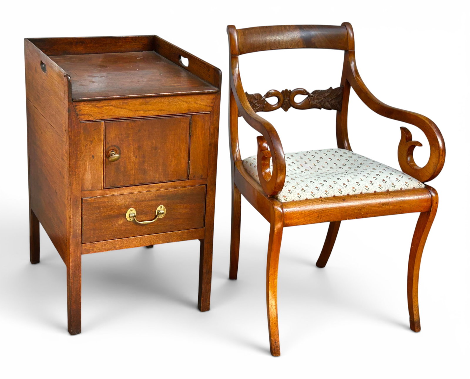 Early American Commode & American Empire Armchair: The lot contains 2 items. There is an early 19th century American commode that has a gallery style top with cutouts on both sides, one door with interior storage, a lower drawer, and brass hardware. T