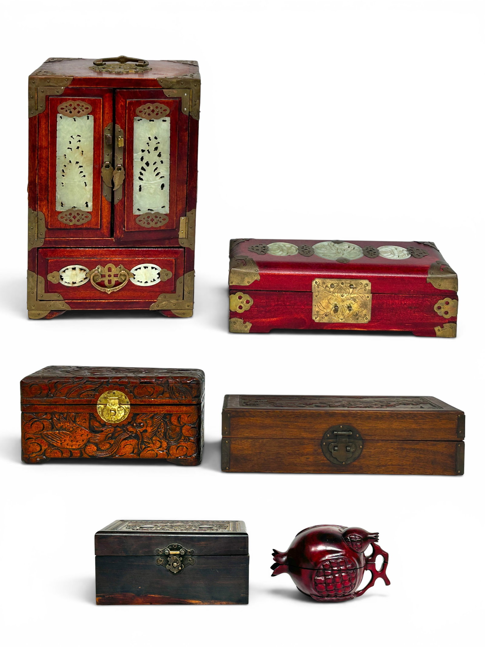 6 Chinese Wood Jewelry Boxes, inc. 2 w/ Jade.: The lot contains 6 carved jewelry boxes, 2 of them with carved jade inlay. One box has carved birds and flowers, and another has a carved scene of foo dogs playing with a ball. The largest box, which 