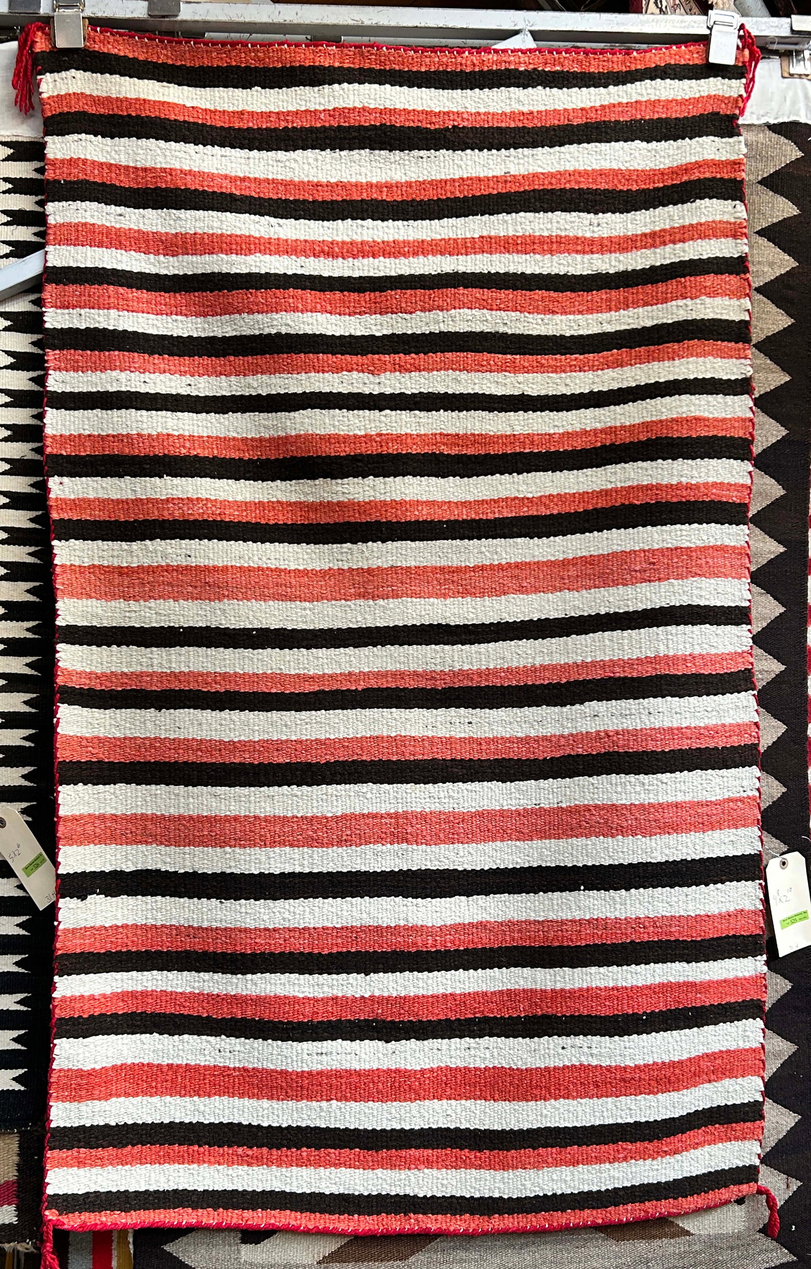 2' 10" x 4' 8" Older Striped Navajo Rug.: The rug looks to be in good overall condition. In-House Shipping is available for this rug. Please see our website for our in-house shipping procedures.