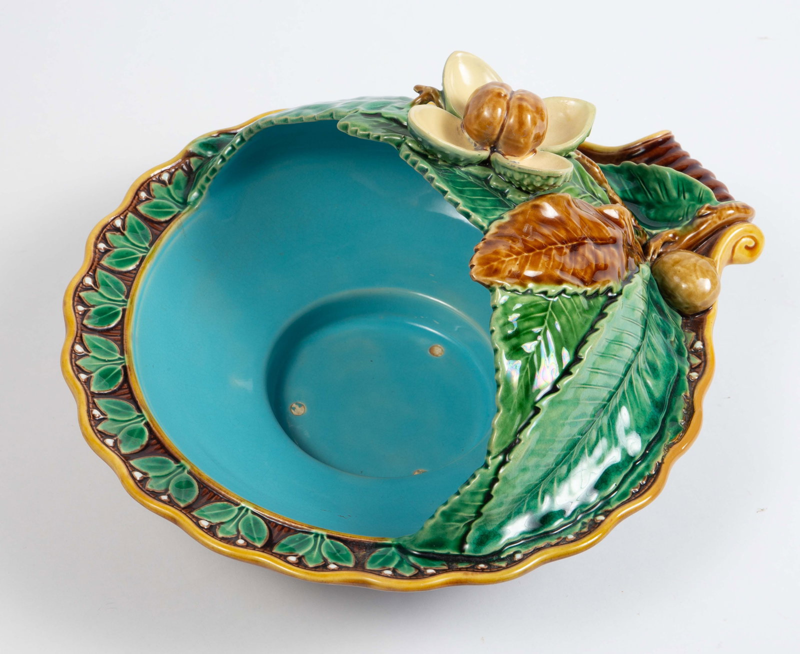 Minton Majolica Chestnut Server Dish.: There are some scratches present, as well as a small crack on the rim. Overall, the piece looks to be in nice condition. It measures 9 5/8" x 11 3/8" x 5 3/4". In-house shipping is available. Please