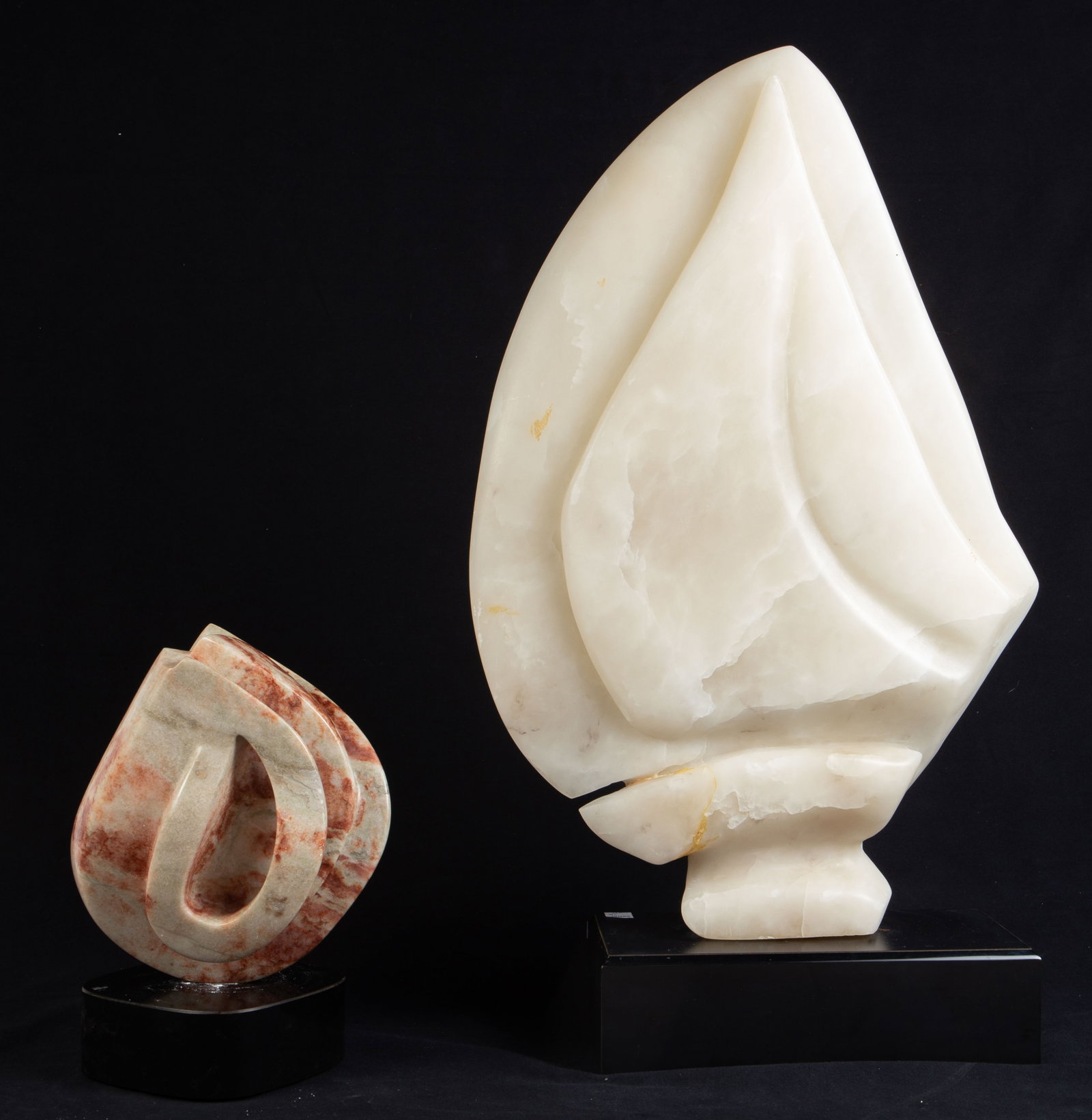 Lot: Alabaster Sailboat, As Is Marble Sculpture.: The As Is abstract marble sculpture appears to be signed, "Bernard Ogron". It will need to be reattached to its base. It measures 8 1/4" x 9" x 5 1/2". The alabaster sailboat is signed as well,