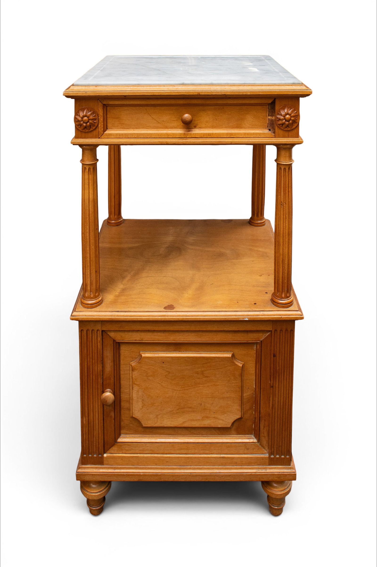 /Victorian Style Marble Top Nightstand Side Table.: The light wood nightstand or small cabinet features a marble top, carved pillars, floral carvings, carved legs and knobs, one top drawer, and a lower door with a marble-lined interior. It measures