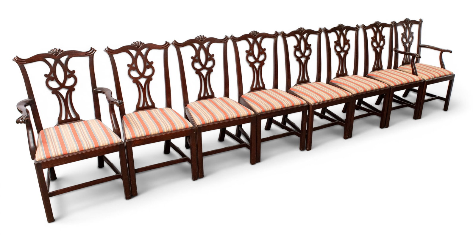 Set of Eight Kittinger Mahogany Dining Chairs.: These Chippendale style chairs are part of Kittinger's Richmond Hill Collection. The manufacturer's label is stamped on the bottom. There are two armchairs and six side chairs. They all have red and b