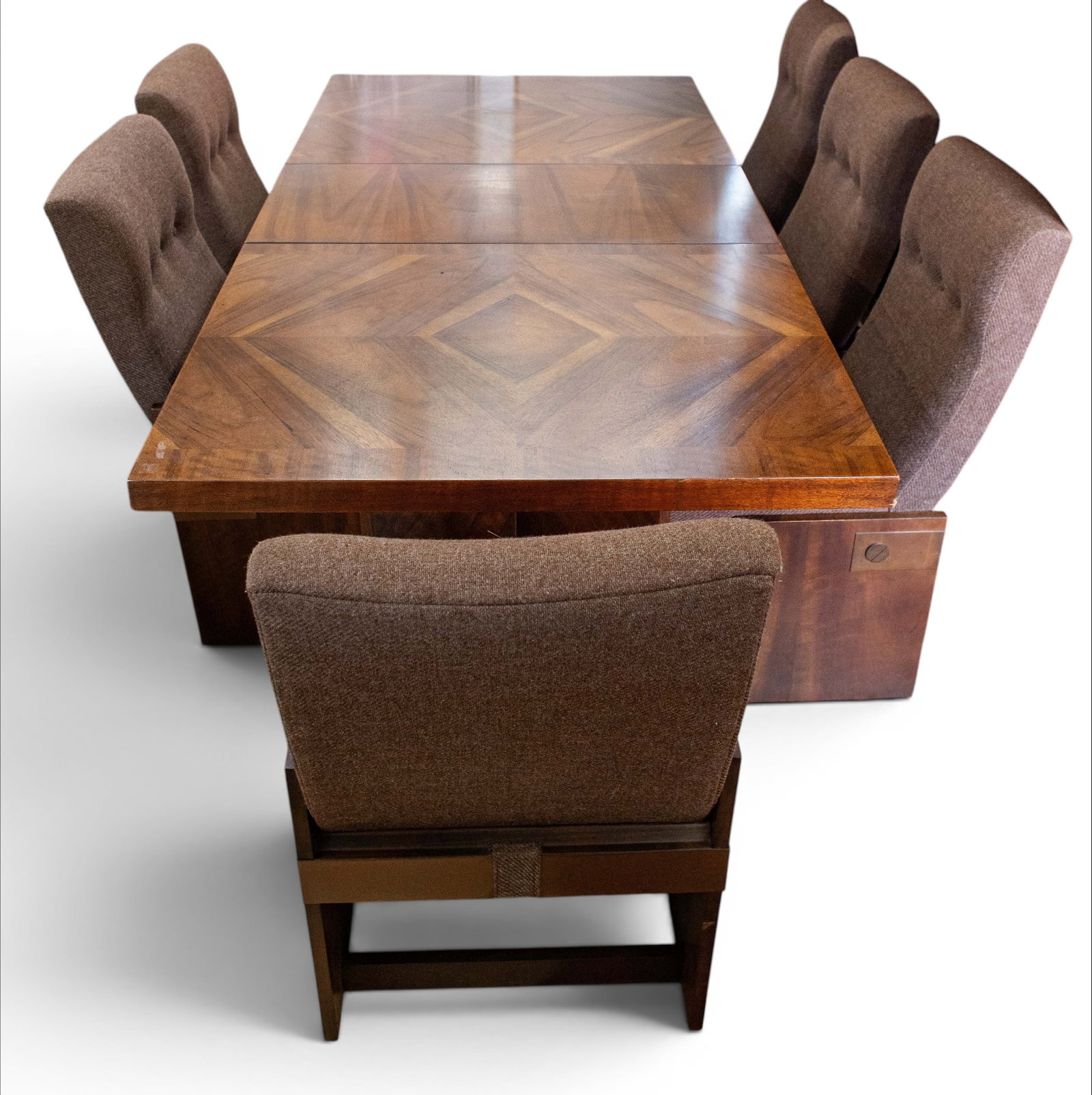 Lane Brutalist Dining Set - Staccato Line.: This walnut veneer Paul Evans style set includes a dining table, two leaves, and six chairs (two of which have arms). The table has a distinctive parquetry design with a geometric pattern and angular 