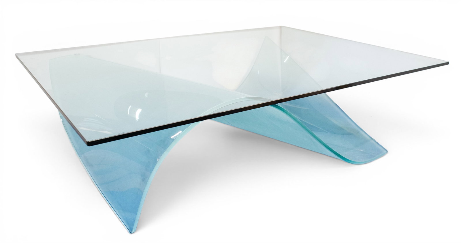 Roche Bobois "Wave" Glass Coffee Table.: This unsigned table is in the style of Maurice Barilone's "wave" or "voiles" cocktail table for Roche Bobois. It has a thick glass top and a sculpted wave-style frosted glass base. There are a few scr
