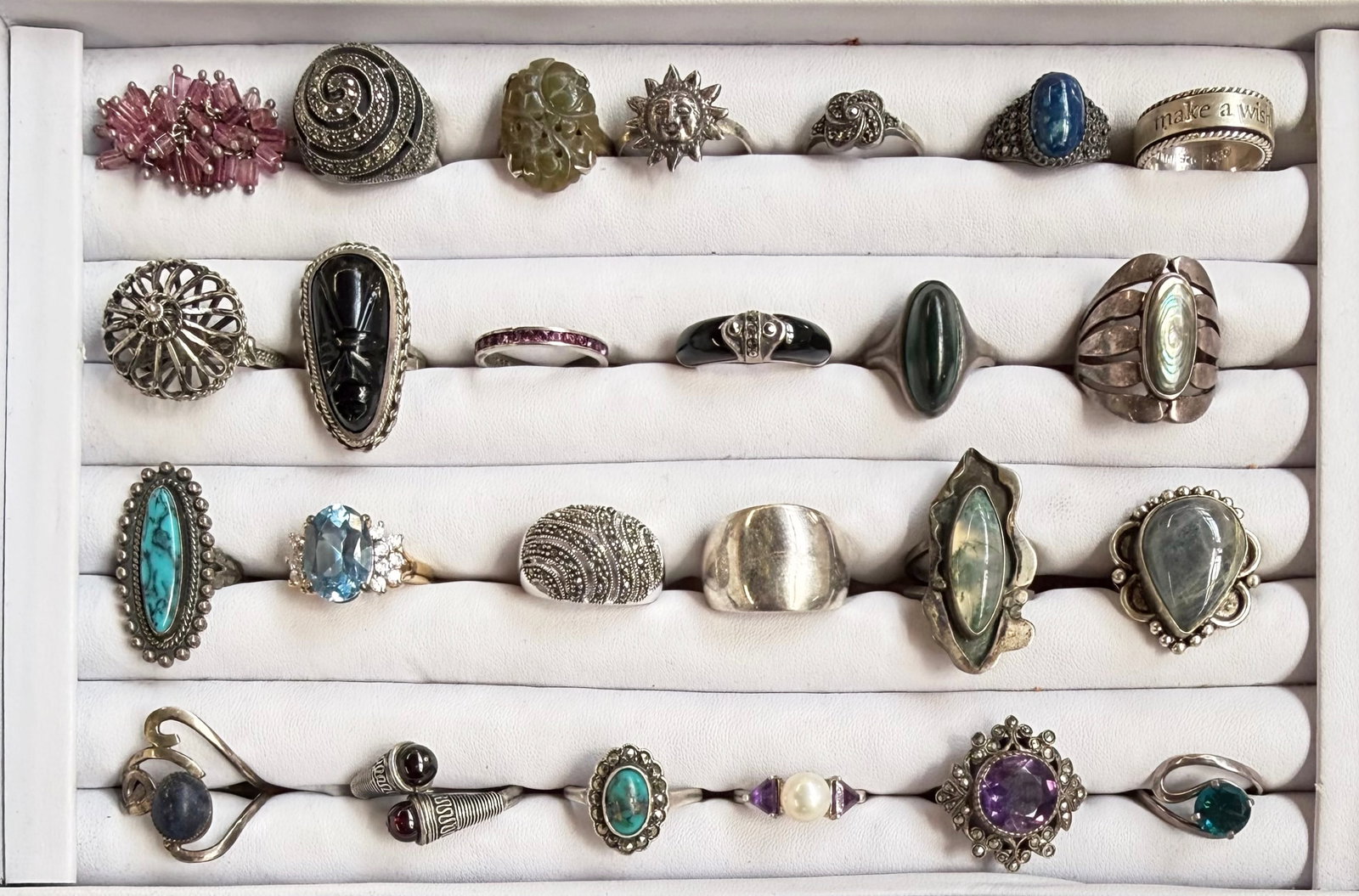 24 Sterling Silver Rings- Mexico, Labradorite, Etc: The lot contains a variety of sterling silver rings. Some of them have stones, including turquoise, marcasite, lapis lazuli, malachite, abalone, onyx, labradorite, amethyst, pearl, and more. Besides