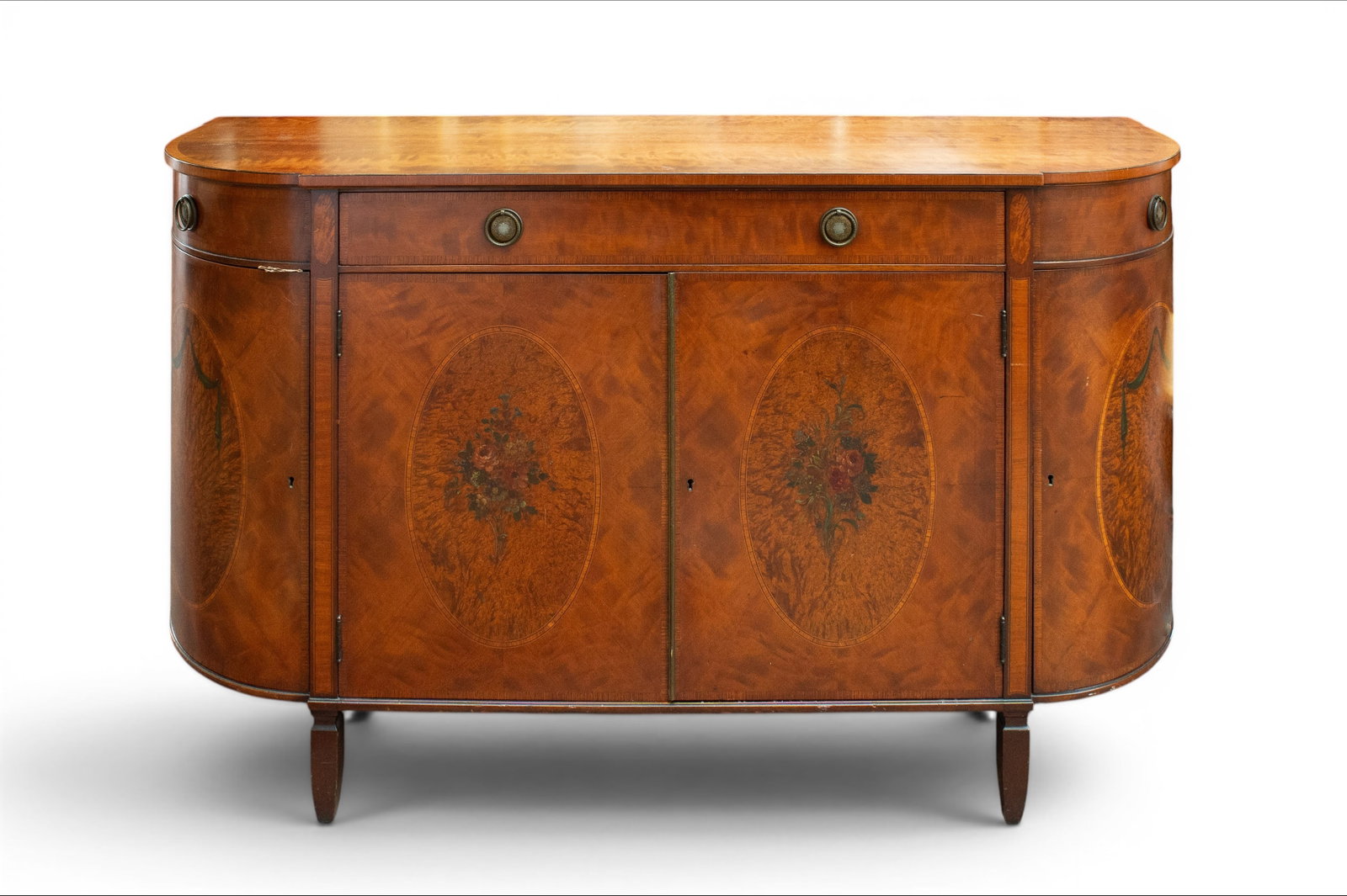 Burled Walnut Inlaid Handpainted Buffet - Irwin.: This curved-front vintage buffet or sideboard has one large upper drawer and three more drawers behind a set of doors. There are two more doors on either side that each open to reveal storage areas.