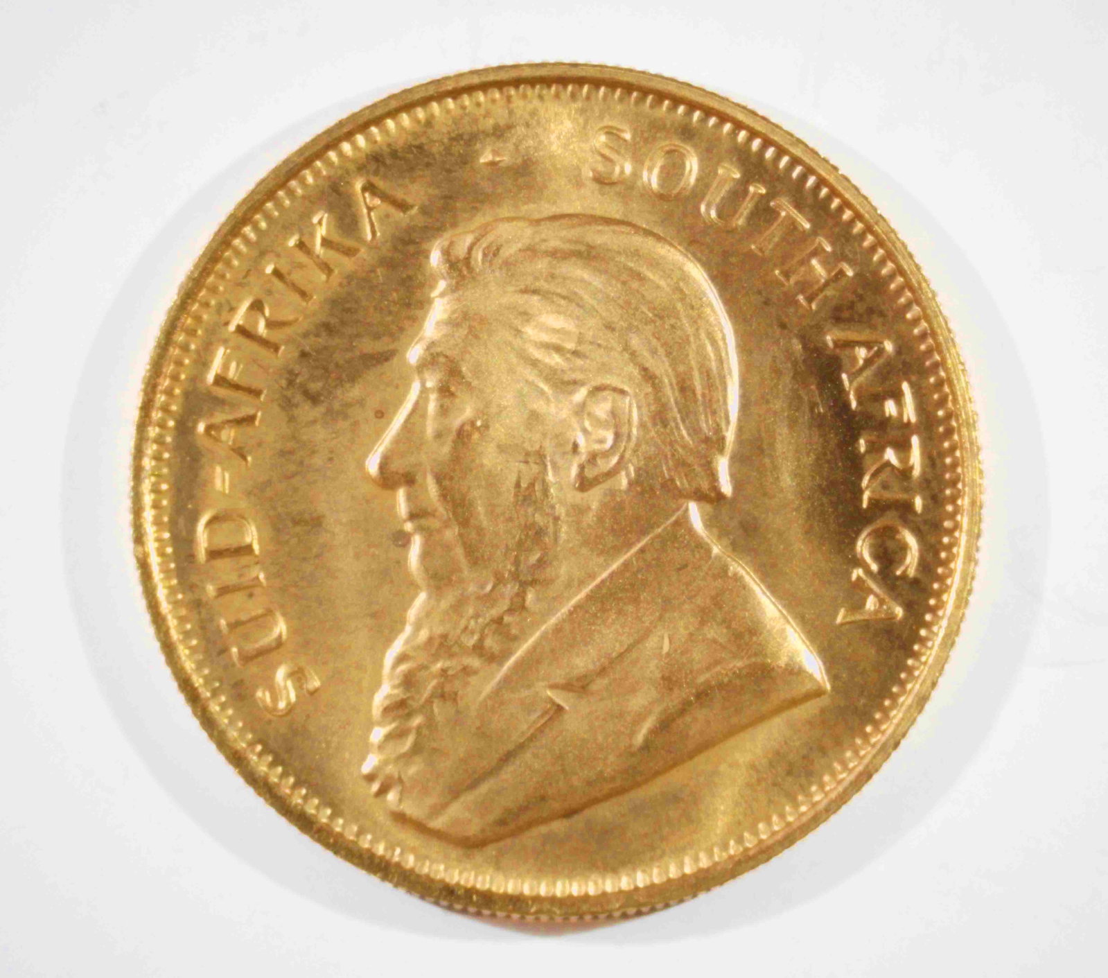 1984 South African 1/2 Ounce Krugerrand Coin.: This is a 22K Gold coin, containing 1/2 troy ounces of actual pure gold weight. It is in uncirculated condition. In-house shipping is available. Please see our website regarding in-house shipping proc