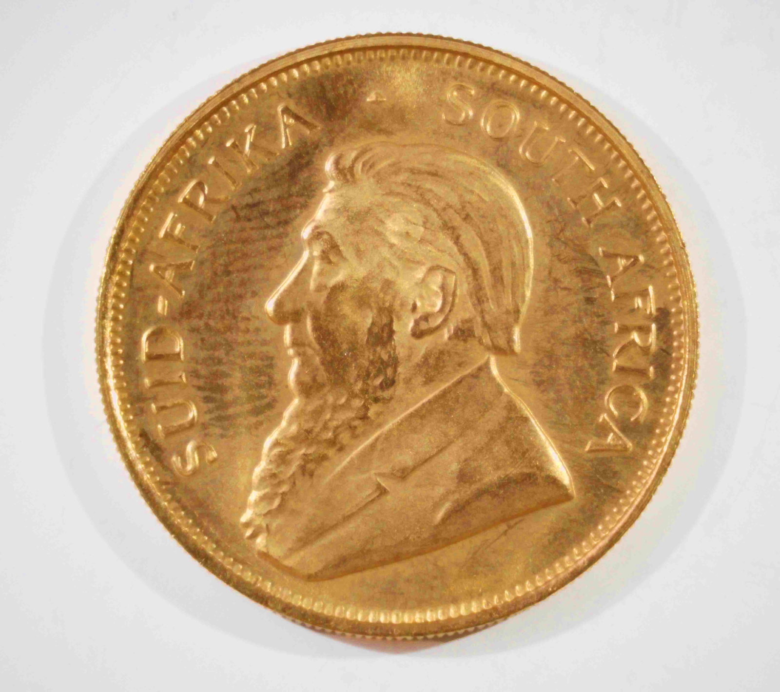 1984 South African 1/2 Ounce Krugerrand Coin.: This is a 22K Gold coin, containing 1/2 troy ounces of actual pure gold weight. It is in uncirculated condition. In-house shipping is available. Please see our website regarding in-house shipping proc