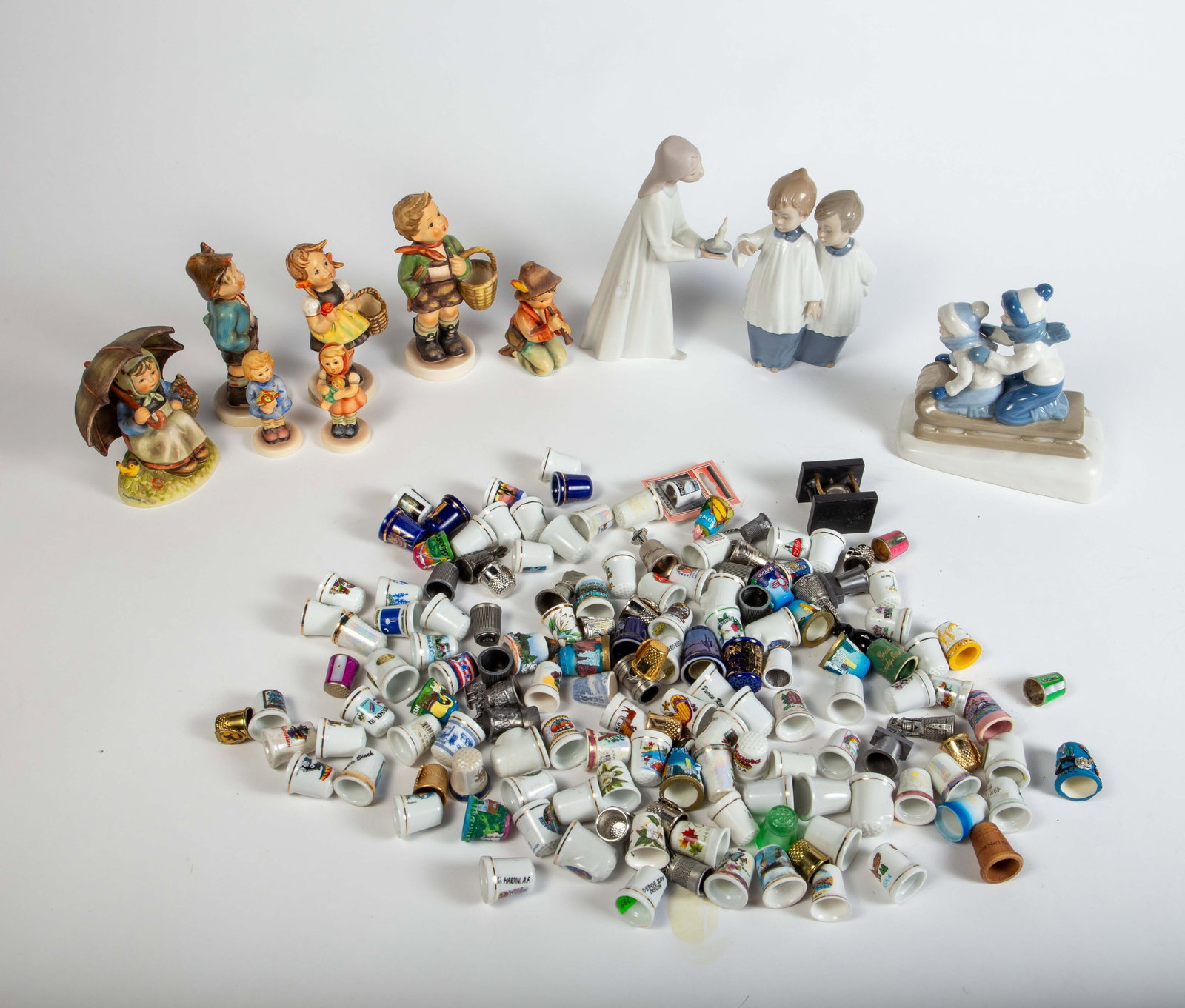 Lot of Mostly Porcelain Thimbles & Hummel Figures. (1 of 9)
