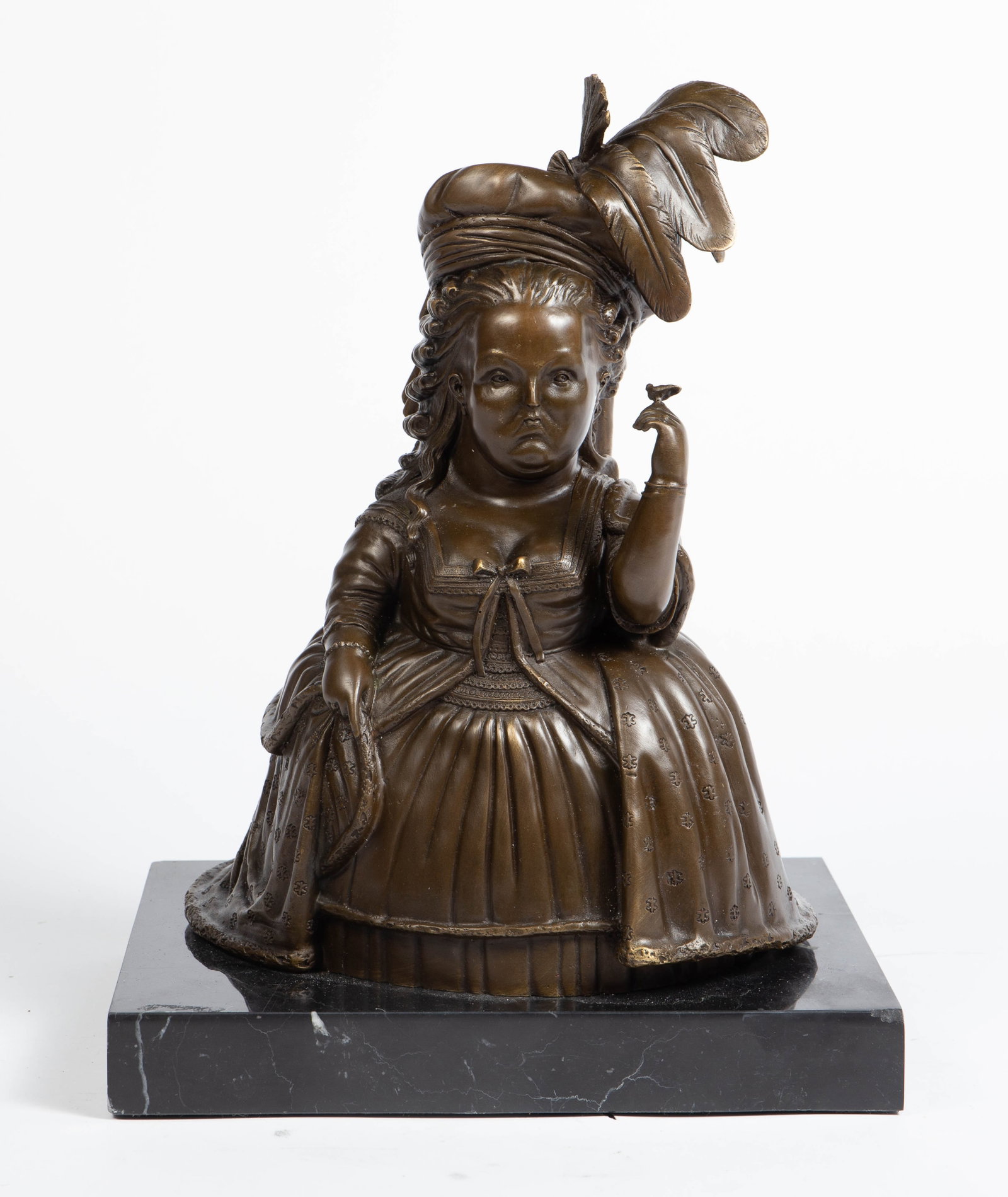 Style of Botero Bronze of Marie Antoinette.: The bronze is unsigned. It sits on a marble base. The base has a chip on two of its corners, otherwise, the piece is in good overall condition. It measures 15" tall, with the base measuring 11 3/4" wi