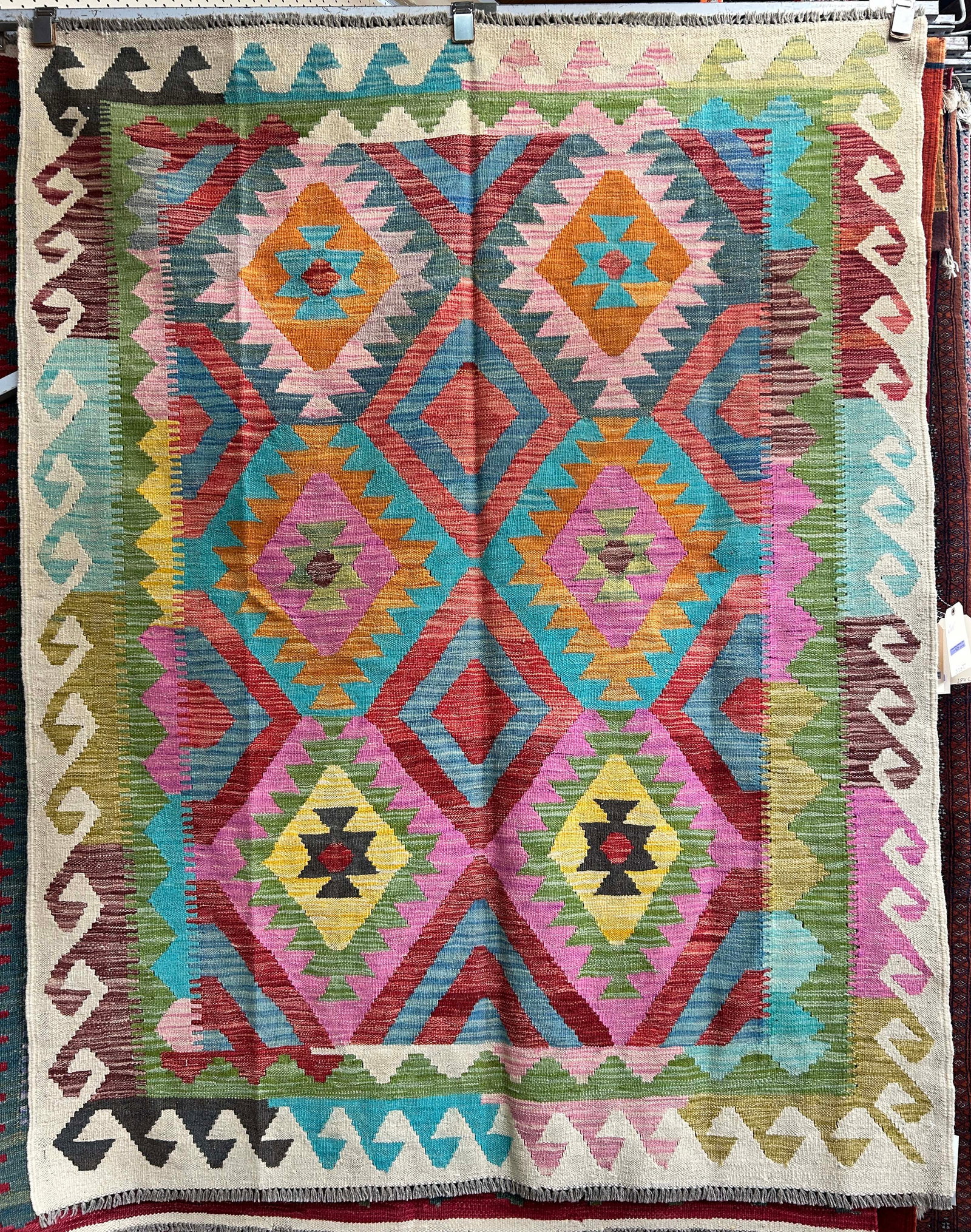 5' 1" x 6' 4" Colorful Pastel Kelim Rug.: The rug is in excellent condition. In house shipping is available for this rug. Please see our website for in house shipping procedures.