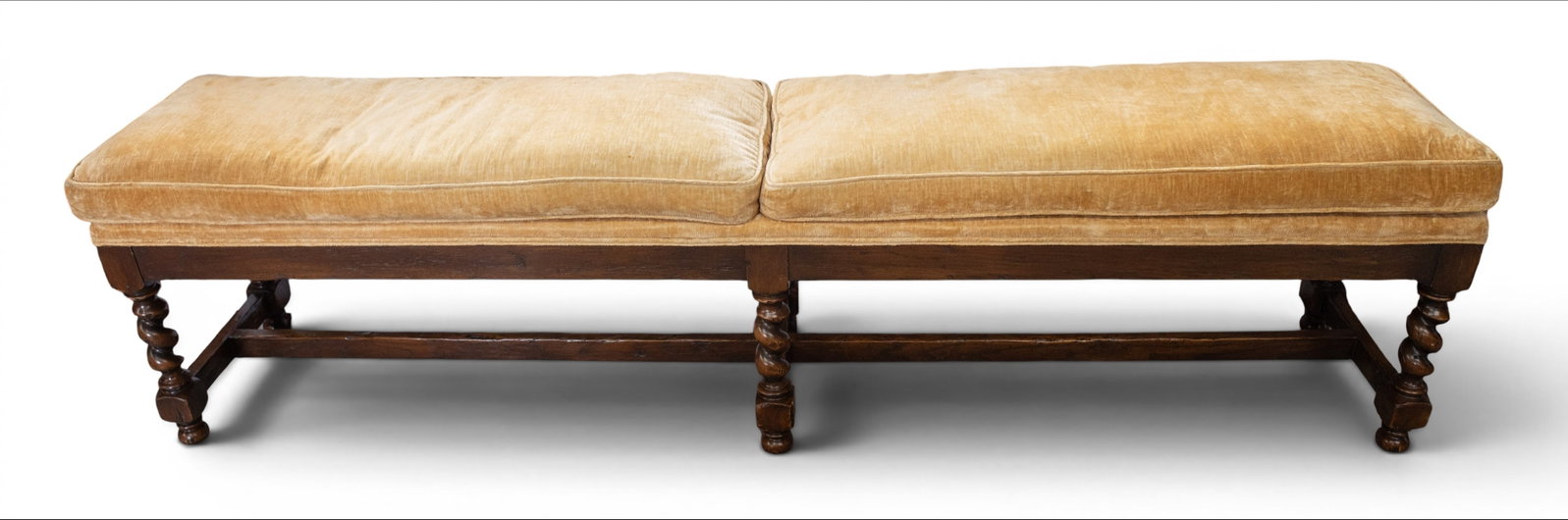 Carved Baroque Style Bench.: This Baroque or Rococo style bench has yellow velvet upholstery and barley twist legs. It has a double cushion style seat. There are a few scratches on the wood, and a minor spot on the upholstery.