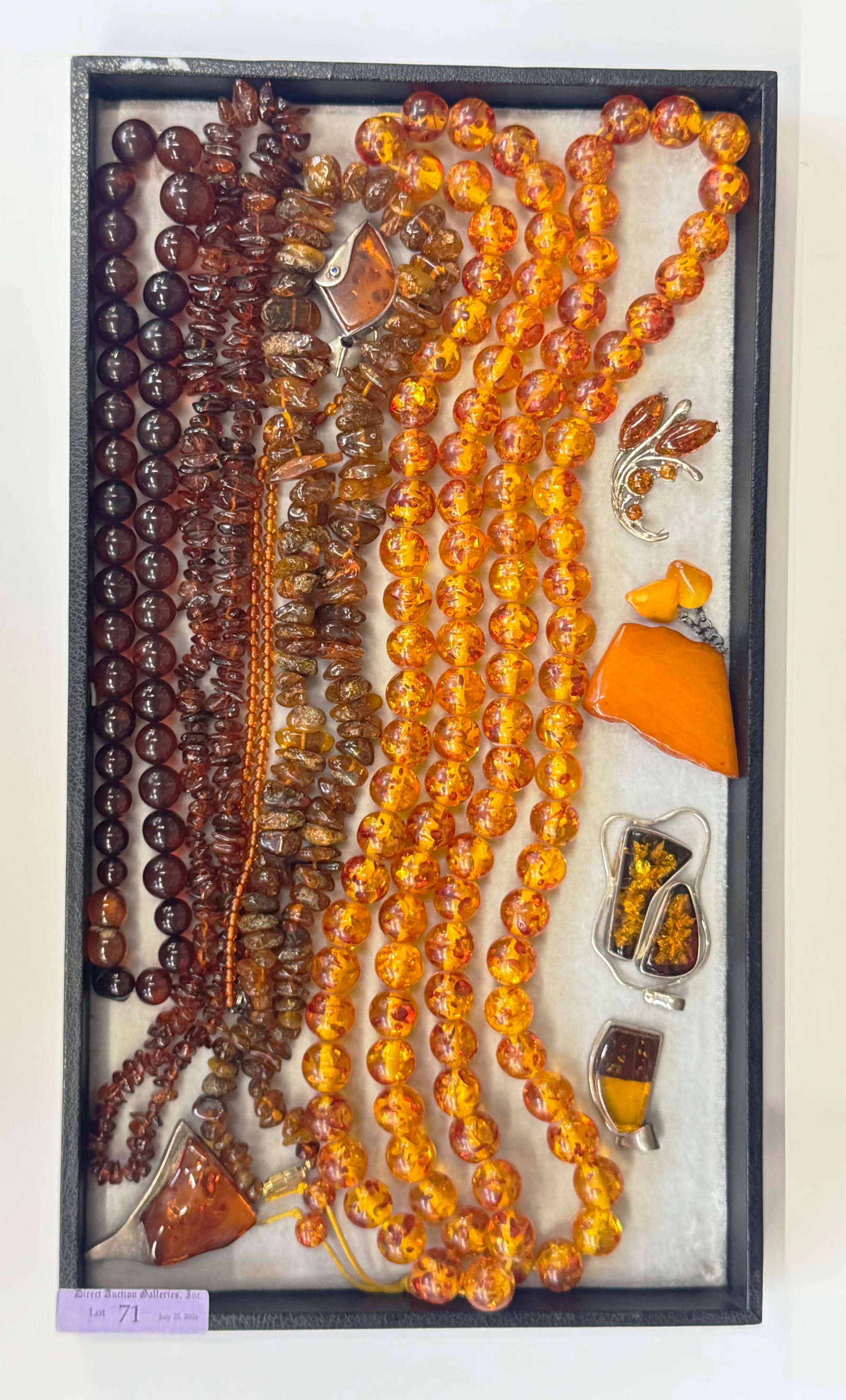 Lot of Amber Jewelry - Butterscotch, Baltic, 925.: The lot contains 10 pieces of amber jewelry. There are 3 brooches, 2 pendants, and 5 necklaces. One of the items is likely reconstituted amber, the rest are natural. All of the pendants and brooches, 