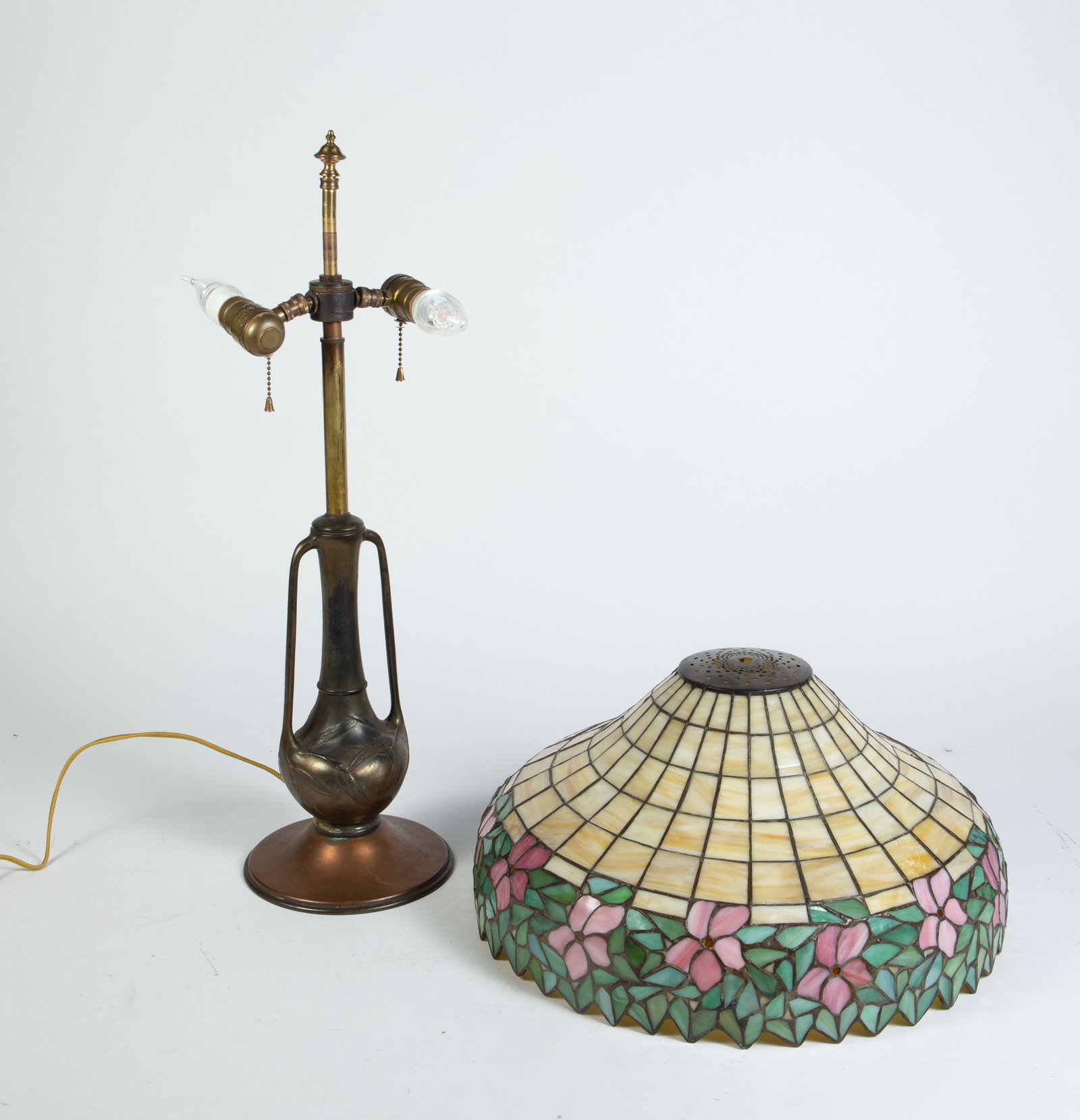 Handel ? Art Nouveau Base w/ Classique ? Shade.: Both the base and stained and leaded glass shade appear to be unsigned. Overall, they present well, with some surface wear on the base. The lamp measures 7 3/8" x 7 3/8" x 26 3/8", with the shade meas