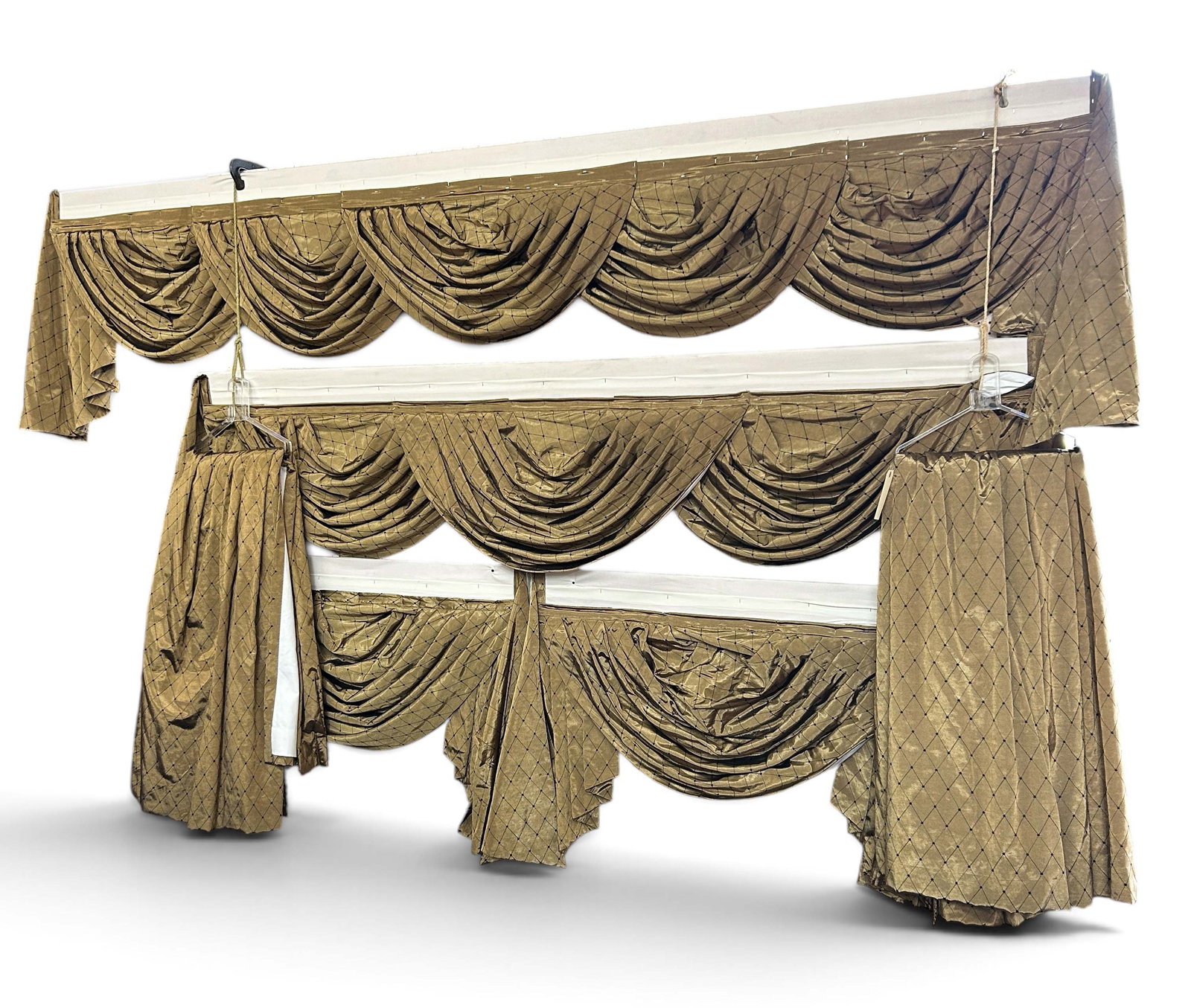 Set of Diamond Pattern Curtains and Valances.: The color is bronze/black. Overall, the silk or satin type fabric looks to be in good condition. The largest valance measures 124" x 26". The smaller valances measure 44" x 26". In-house shipping is a