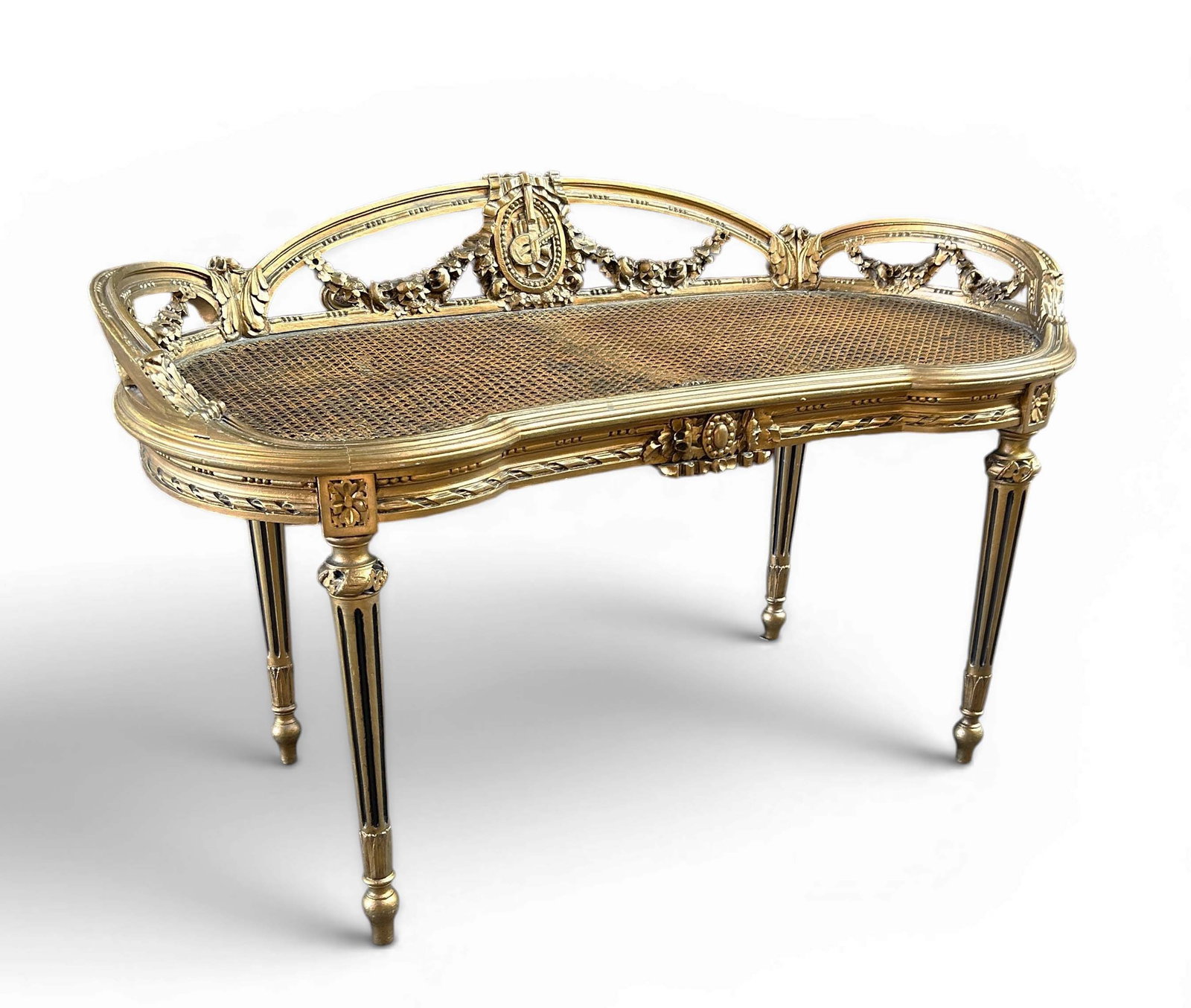French Carved Giltwood Cane Bench.: This Louis XV style bench or settee has a cane seat, floral carvings, and cabriole legs. There is a bit of broken cane weaving in one corner. Overall, it is in good condition. It measures 41 1/2"