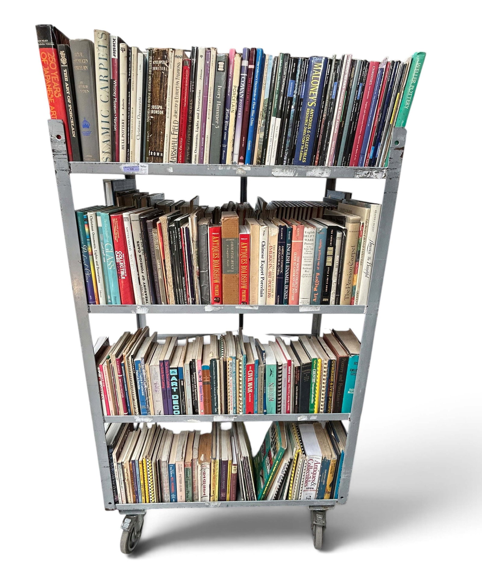 Lot: Vintage Books on Antiques, Auction Catalogs.: The lot includes Sotheby's, Christie's, Hindman, and Toomey catalogs. The books cover topics such as glass, pottery, dolls, teddy bears, Oriental rugs, fountain pens, and more. The largest item in the