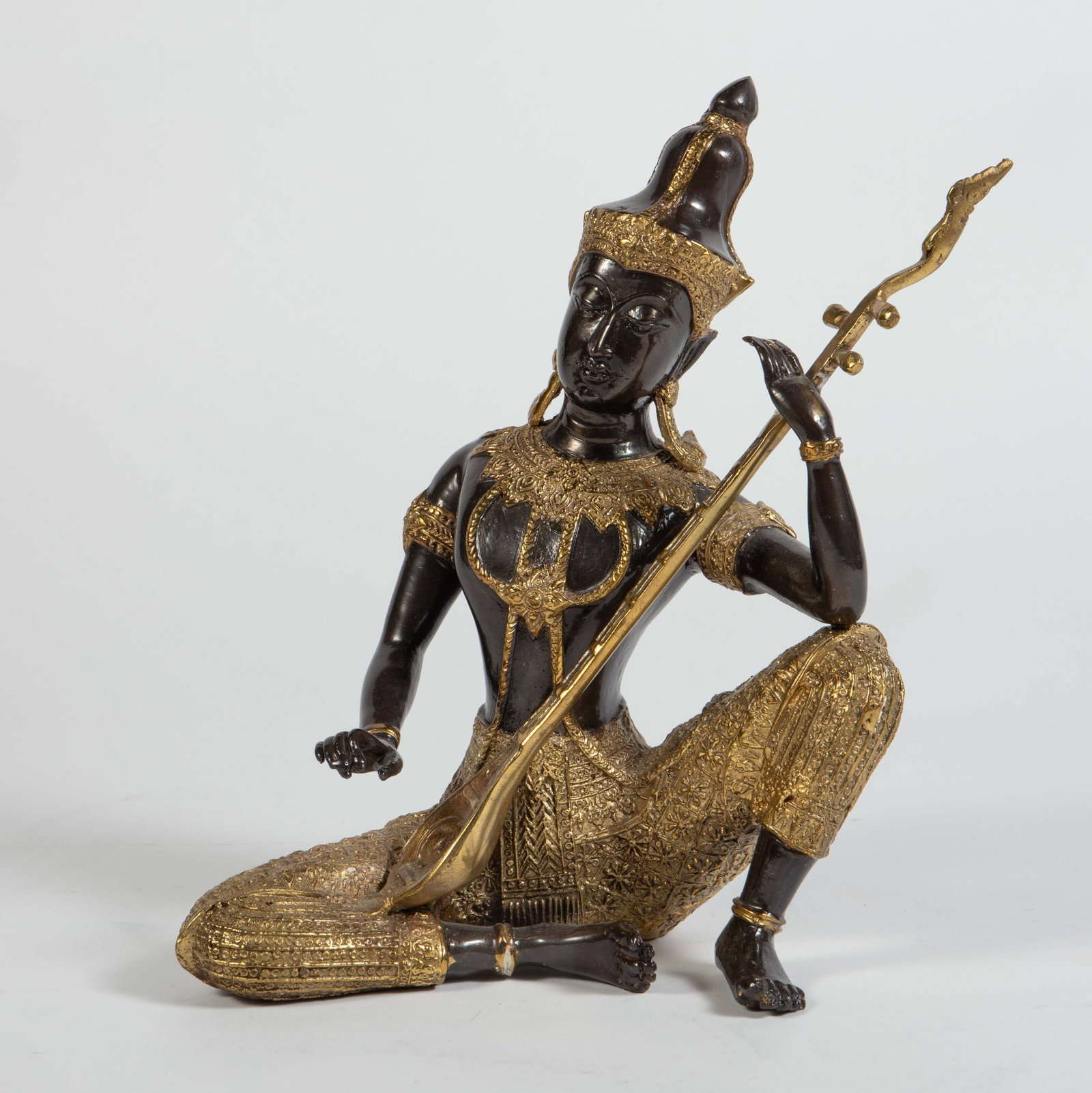 Thai Bronze Prince Musician Sculpture.: Overall, this piece looks to be in good cosmetic condition. It measures 8" x 4 1/4" x 7 5/8". In-house shipping is available. To receive the best shipping rate on this item, please check the "Self Arr