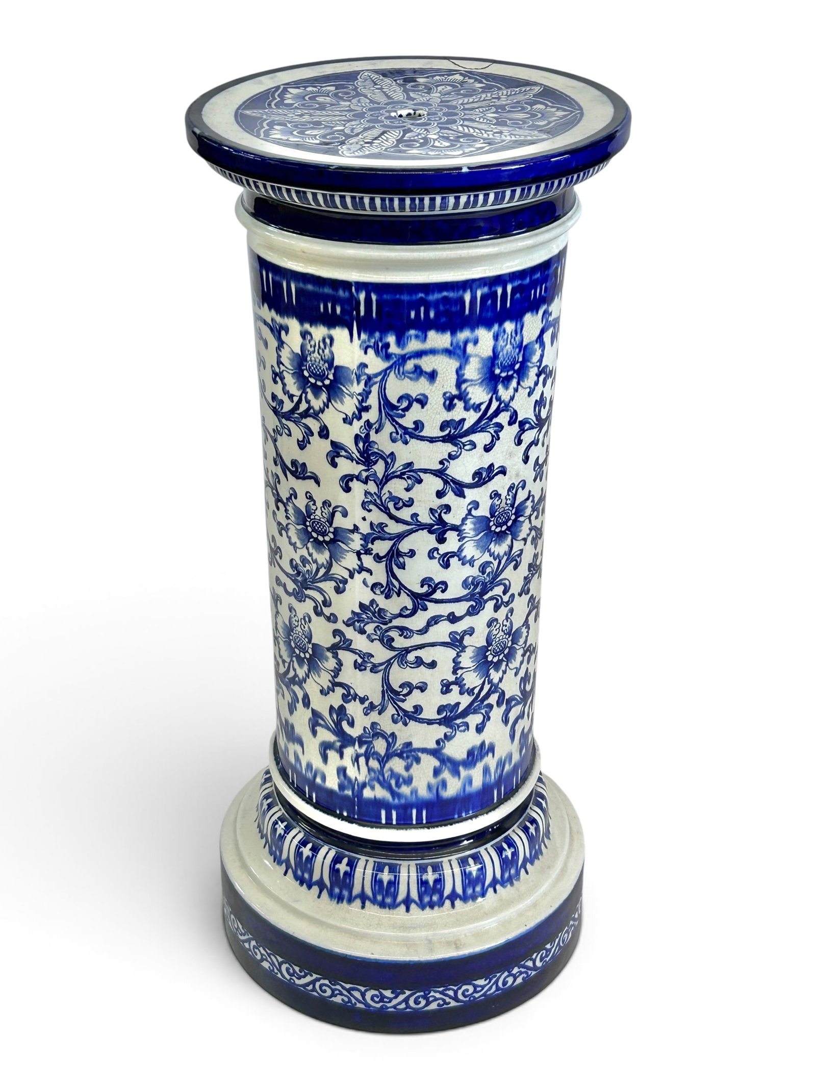 Blue and White Porcelain Pedestal Sgd Minton.: This pedestal or plant stand has a floral design, and is signed "Minton" on the bottom. It has a large repaired spot on the top, but is in good condition otherwise. It measures 26 1/2" tall, with an
