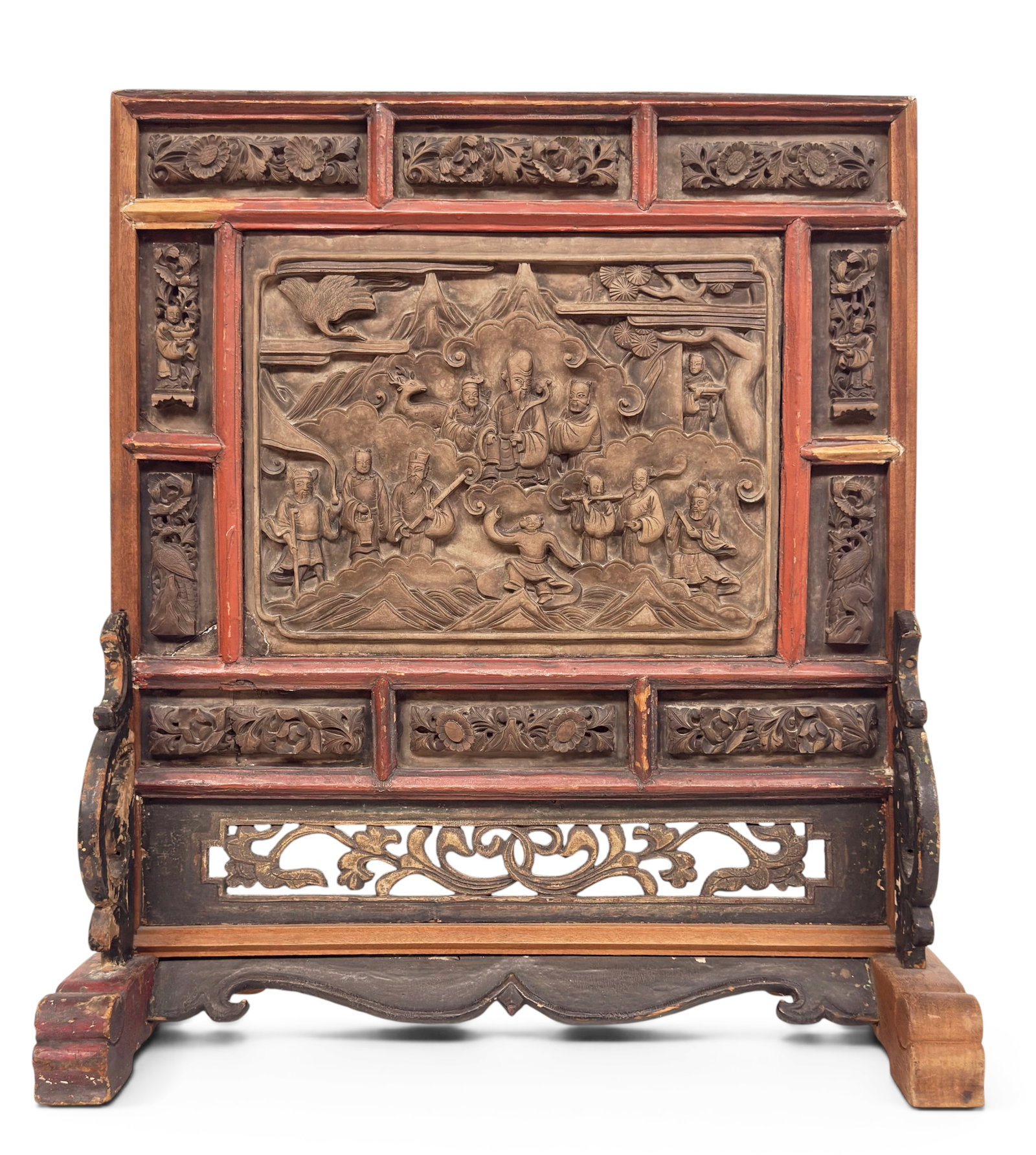 Large Antique Chinese Mixed Wood Table Screen.: The antique late 19th or early 20th century piece is composed of carved mixed wood panels. The main panel depicts male figures or immortals on one side, and an old scholar figure on the other. The sma
