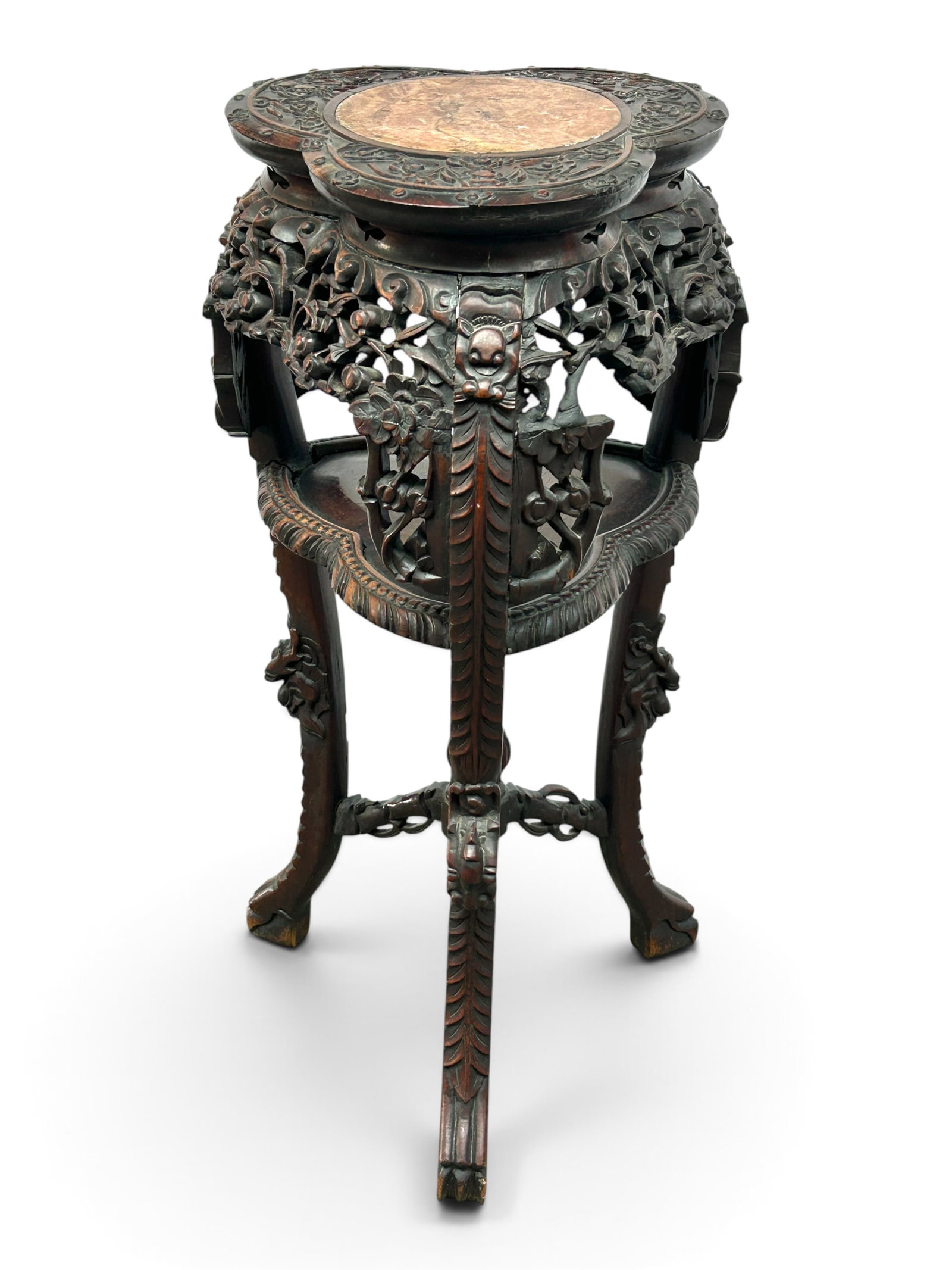 Antique Chinese Carved Marble Top Stand.: The stand has a marble top, intricate floral and openwork relief carvings, a lower shelf, a carved stretcher, and carved legs. It measures 30 1/2" tall, 13" wide, and 12 1/2" deep. There are a few scr