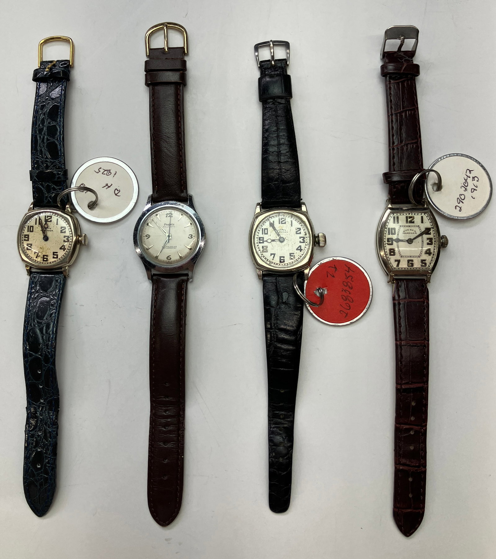 Lot Most. Dueber Hampden Watches - Diadem, Stark.: The lot contains 4 wristwatches. There are 3 antique Deuber Hampden pieces from the early 20th century, and one mid century Phenix Rollamatic 17 jewel watch. The antique watches are a Deuber Hampden M