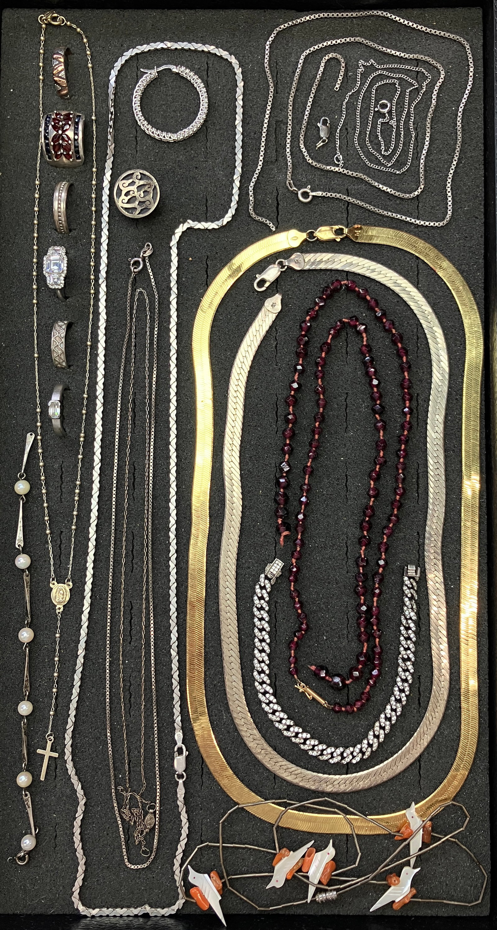 Lot Sterling & More Jewelry - 14K Clasp, Fetish.: The lot contains 16 functional pieces of jewelry, a broken garnet necklace with a 14K gold clasp, and a small group of single earrings and other sterling elements. There are 6 chains, including a gold