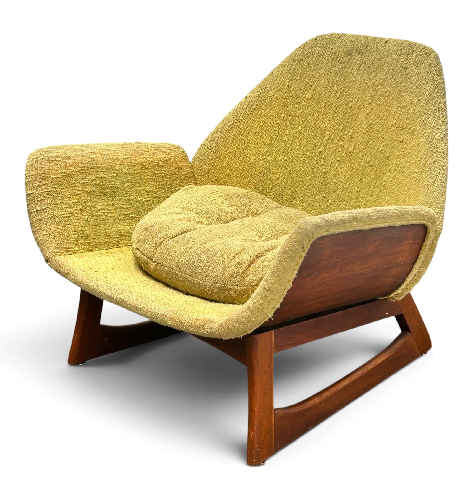Mid Century Adrian Pearsall Style Lounge Chair.: The oversized chair has a wooden base, and bentwood sides. It is upholstered in light yellow fabric, and has a tufted back cushion. It is missing the seat cushion. It measures 31" tall, 36 1/2" wide, 