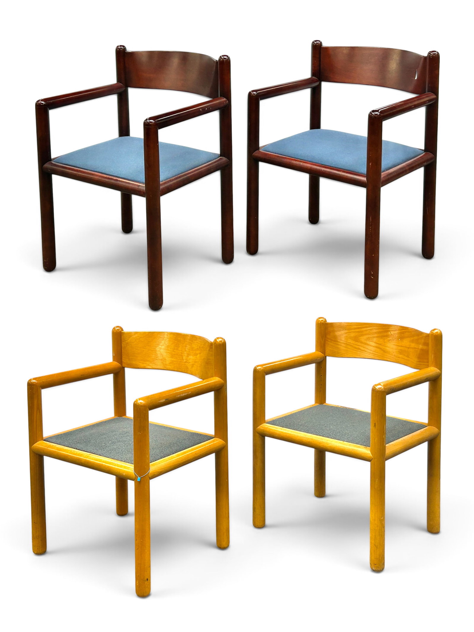 Four Massimo Vignelli for Sunar Acorn Armchairs.: Two of the chairs have light wood frames with gray upholstered seats. Two are stained a dark tone with navy upholstery. They all have labels on the underside. The chairs with the lighter frames are in