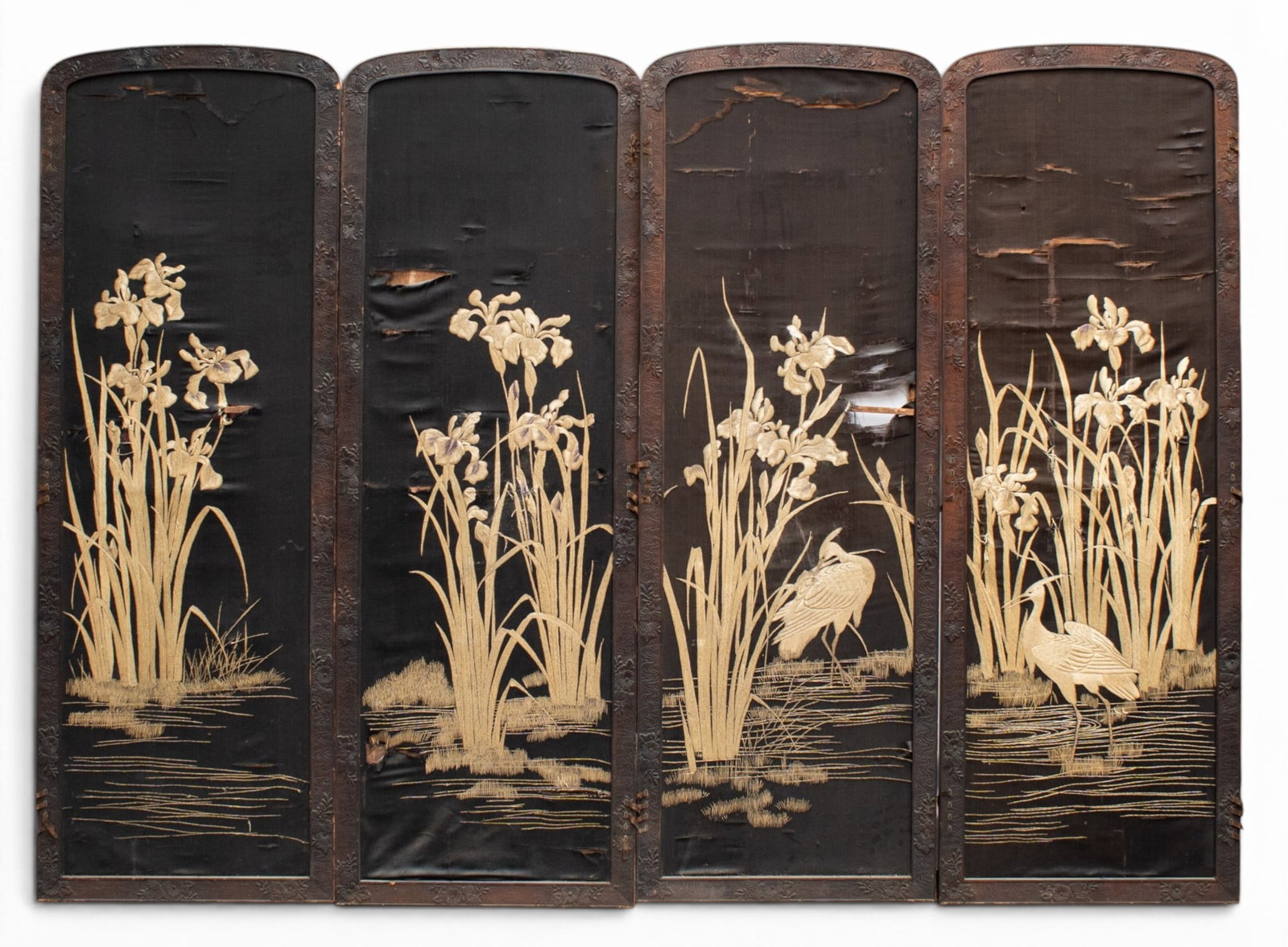 Asian 4-Panel Embroidered Screen w/ Carved Frames.: The large and antique Japanese floor screen or room divider has 4 arched panels with intricately carved wooden frames. Each panel has black silk interiors with gold tone silk embroidered needlework fl