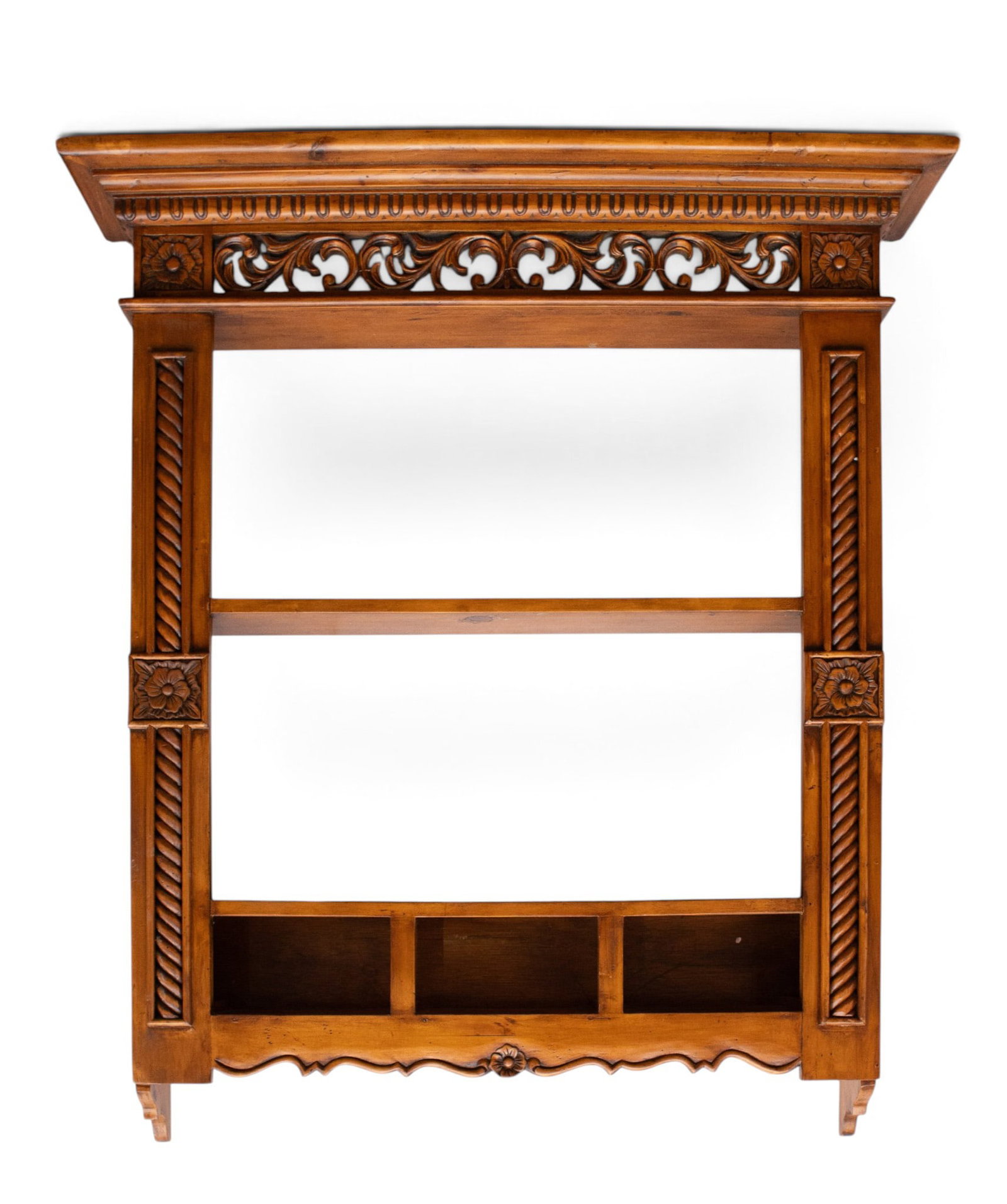 Wall Hanging Mantel Style Carved Display Shelf.: The wooden piece has barley twist side panels along with square floral medallions, a pierced scrolled panel on the top below the mantel, and a carved apron with a central carved flower. It is two