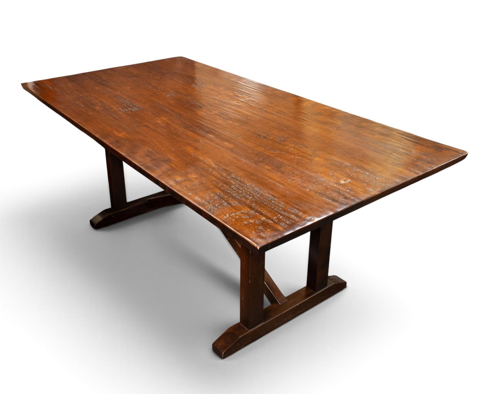 Vintage Nichols & Stone Trestle Dining Table.: The expandable farmhouse style dark wood dining table has a factory distressed top, and two extra leaves which are branded Nichols & Stone Co. on the undersides. This is an original Nichols & Stone