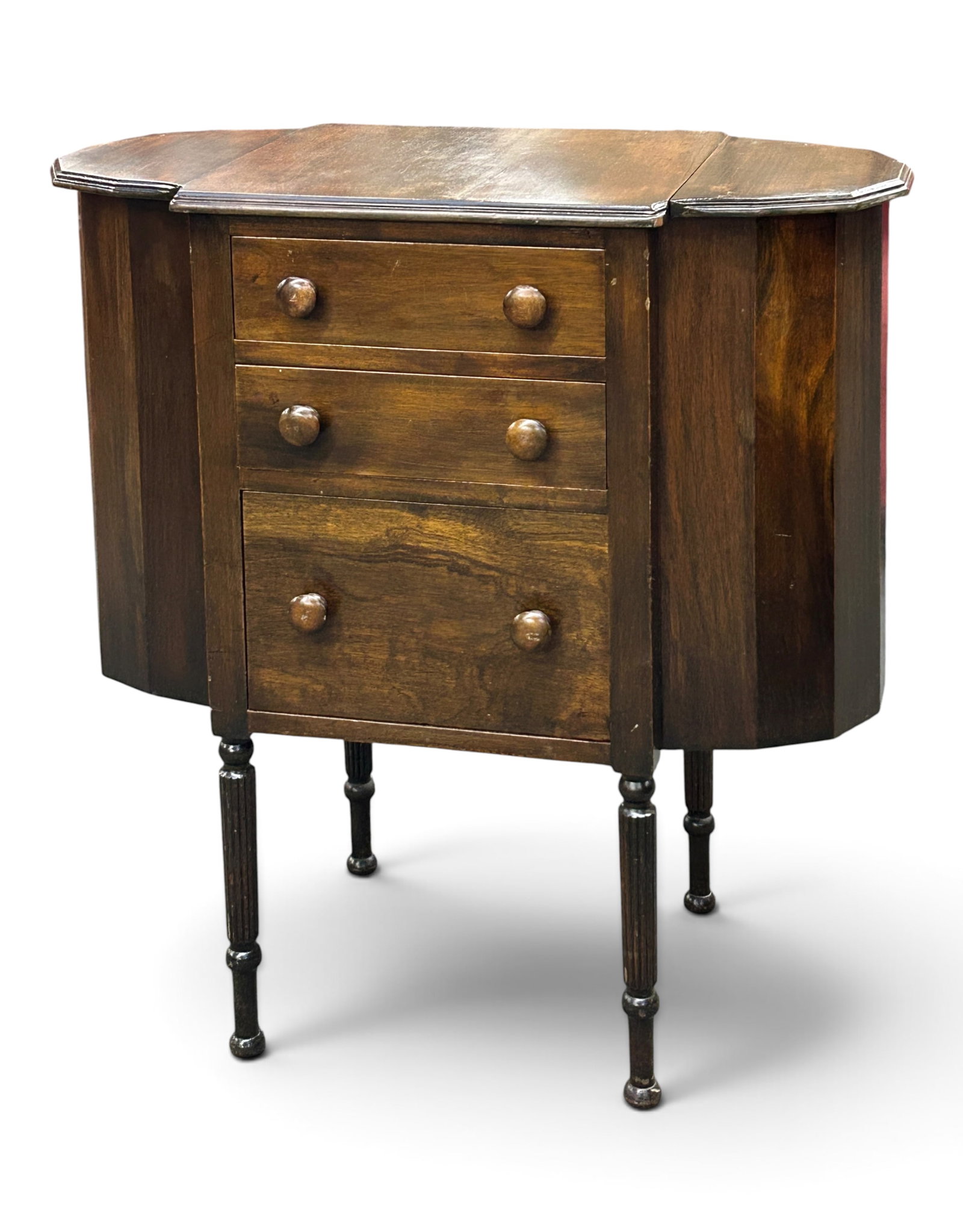 Mahogany Martha Washington Sewing Cabinet.: The antique cabinet has two lift-top side storage sections, three drawers with wooden knobs, and 4 carved legs. It measures 28 1/2" tall, 28 1/8" wide, and 14 1/4" deep. There are some scratches,