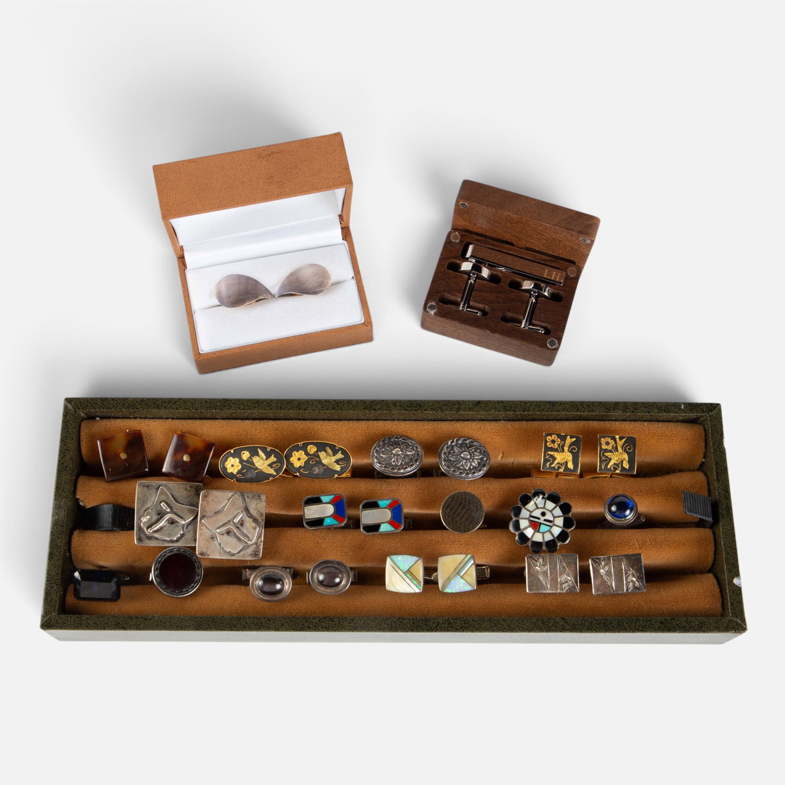 Lot of Cuff Links, inc. Sterling, Stones, and G.F.: The lot contains 10 pair of cuff links, one cuff link and tie clip set, and 5 single cufflinks. Six of the pairs are sterling silver, as well as two of the single pieces. The marks observed on the