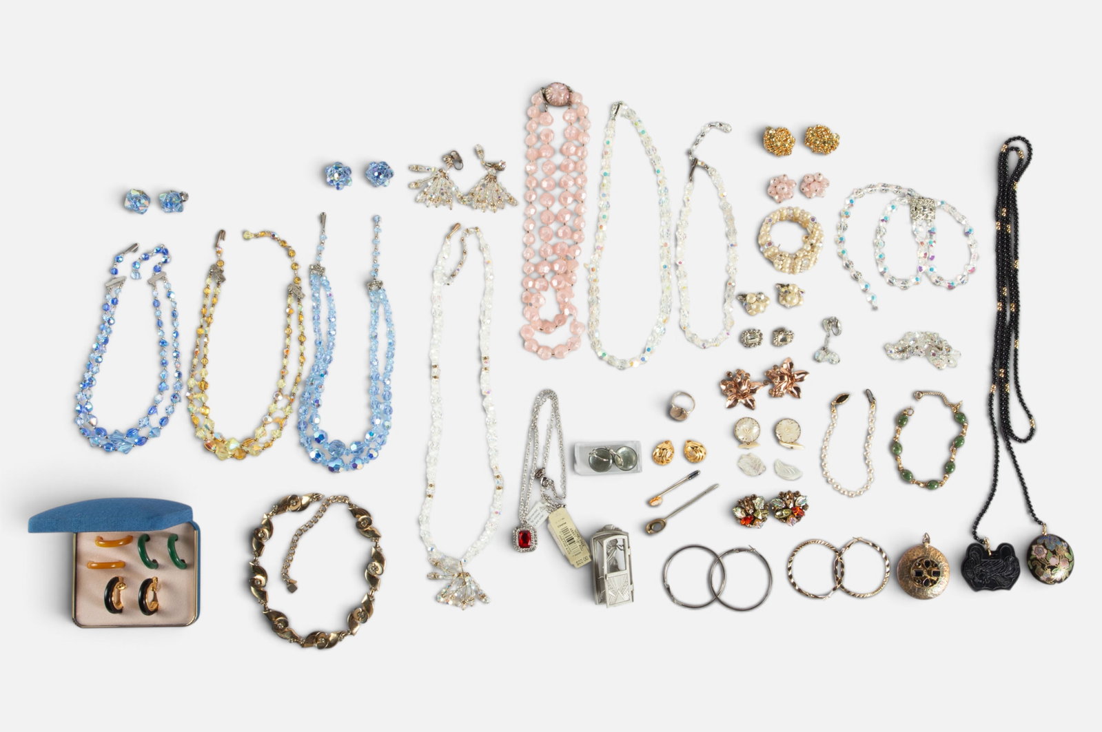 Lot Costume Jewelry - Crown Trifari, Borealis, Etc: The lot contains 36 pieces of jewelry. There are necklaces, bracelets, brooches, earrings, a pair of cuff links, stick pins, a ring, a cloisonne and carved black stone necklace, and five 2-piece sets.