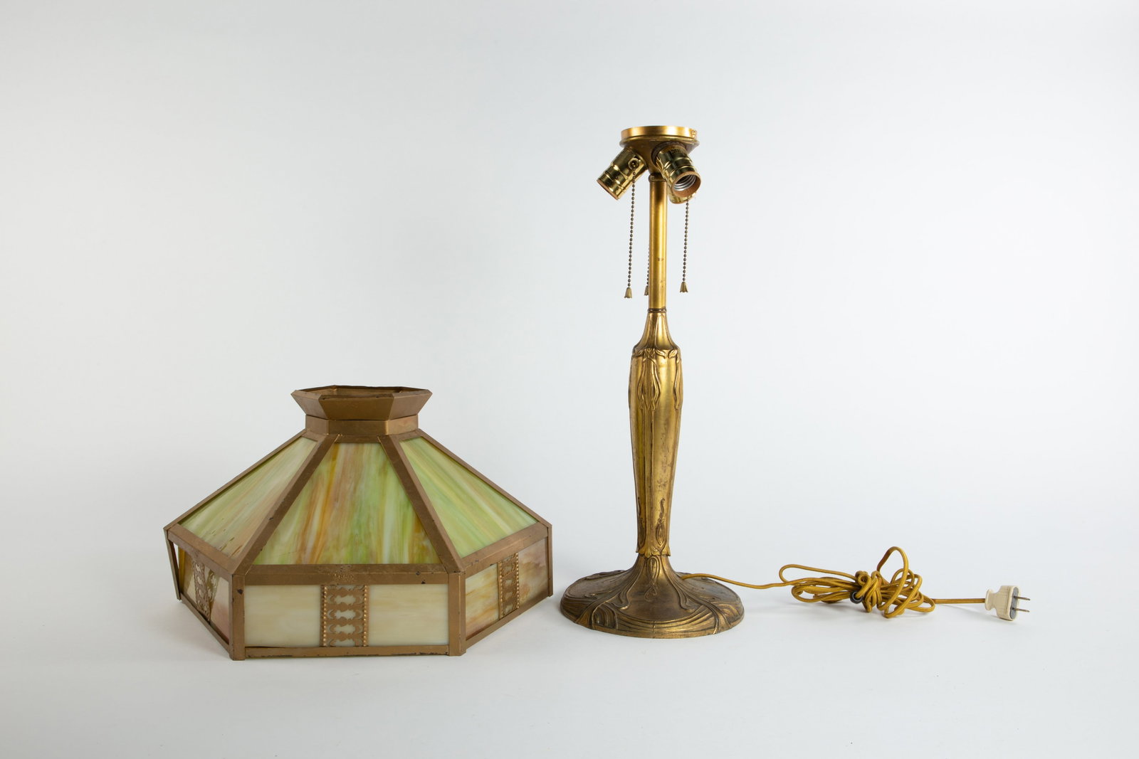 Art Nouveau Table Lamp w/ Slag Glass Shade.: There is no cap or finial. The six-panel shade has some loose areas on the frame that prevent some of the glass from fitting snugly inside. There is also some gold paint loss. The lamp measures 7