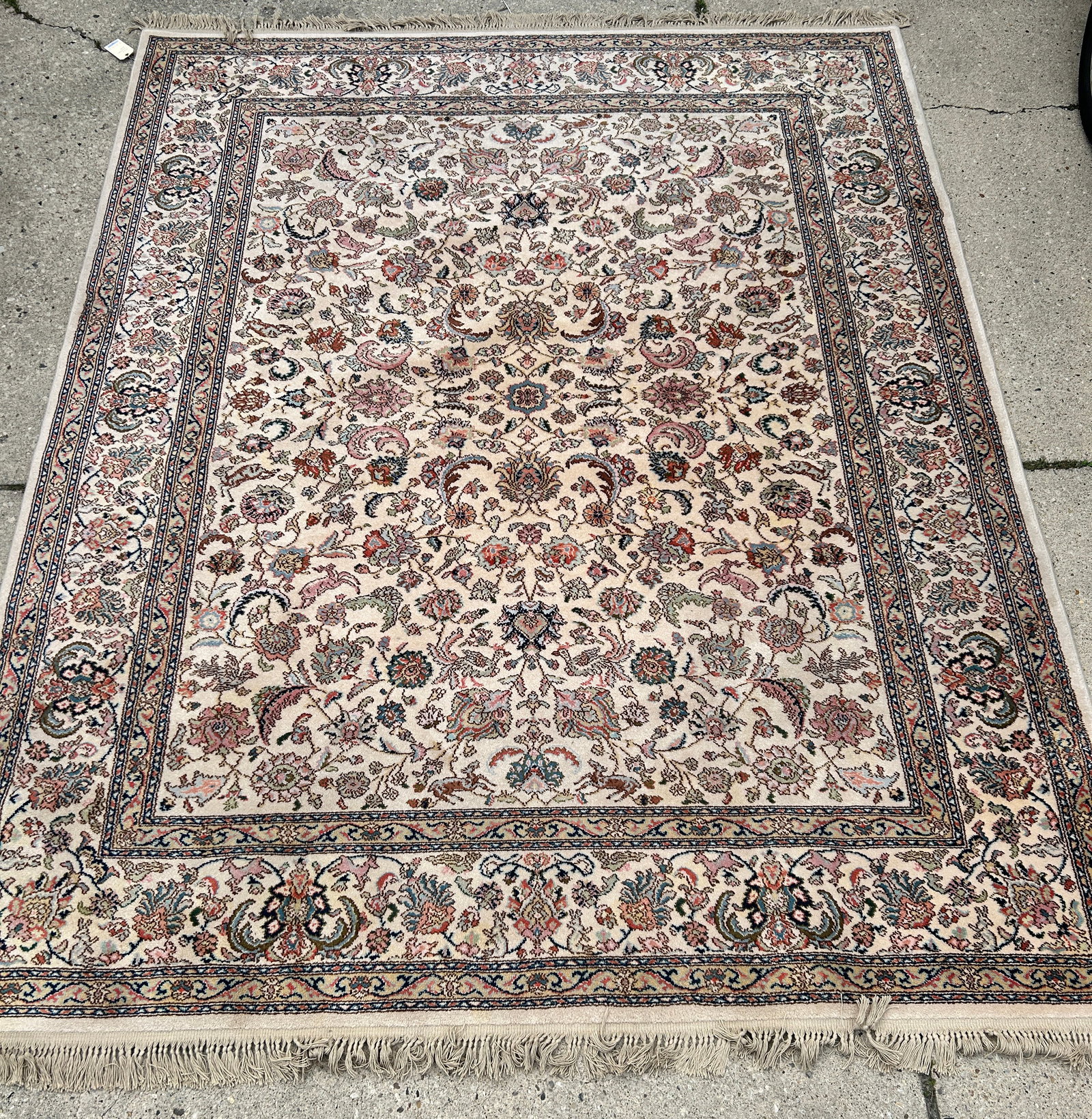 8' 8" x 10' 6" Beige Karastan Rug.: The rug looks to be in good overall condition. In-house shipping is available. To receive the best shipping rate on this item, please check the "Self Arranged" button at checkout. Our in-house