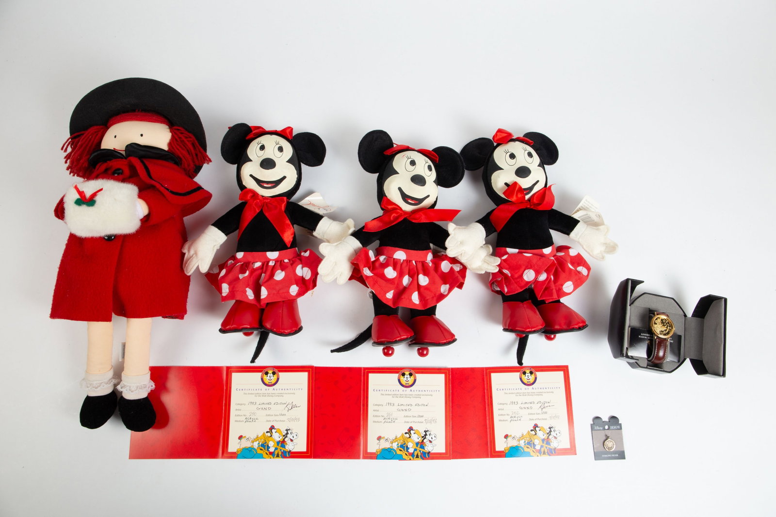 Lot: Gund Minnie Mouse Plush Toys, Disney Watch.: This lot includes three 13" Limited Edition reproductions of the original 1947 Minnie Mouse plush toys by Gund. They all come with certificates of authenticity, and are numbered 250, 251, and 252 out 