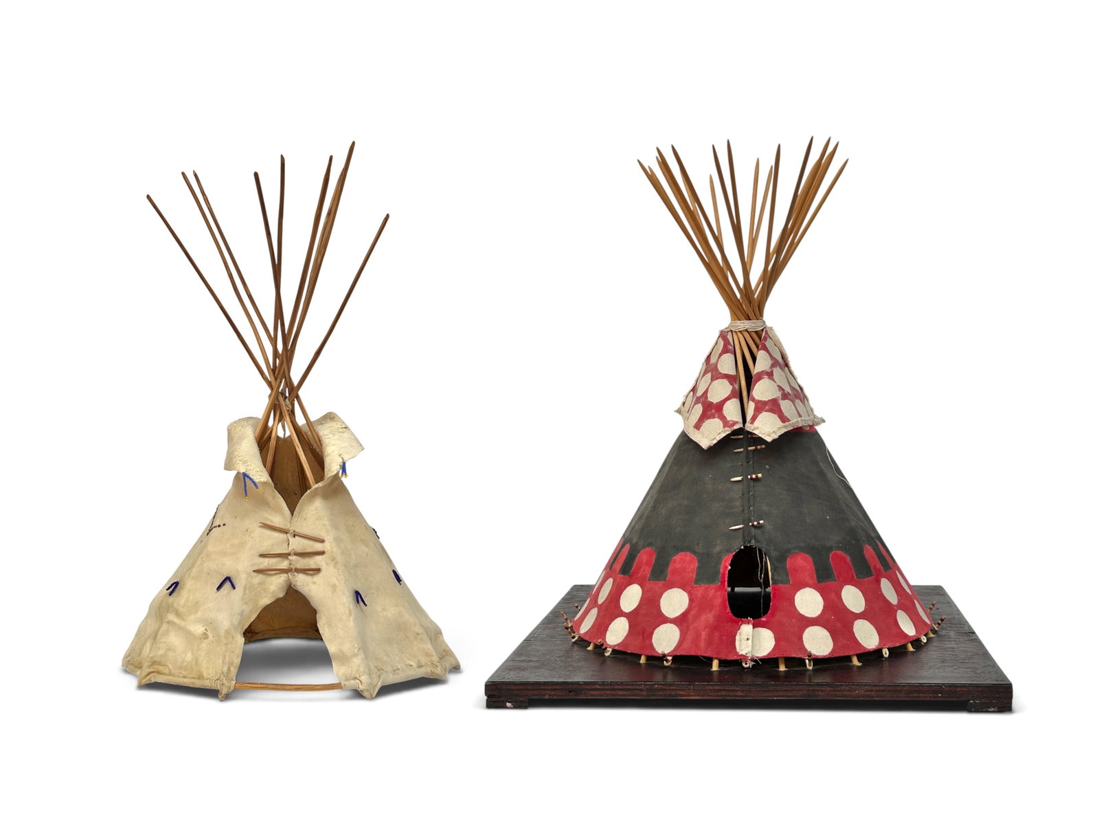 Lot of 2 Diorama Model Teepees- Buckskin & Canvas.: The beaded buckskin teepee is smaller, without an attached base. It measures 15" x 15" x 22 3/4". The painted canvas teepee is on an attached wood base. The total dimensions are 22" x 22" x 25". Third