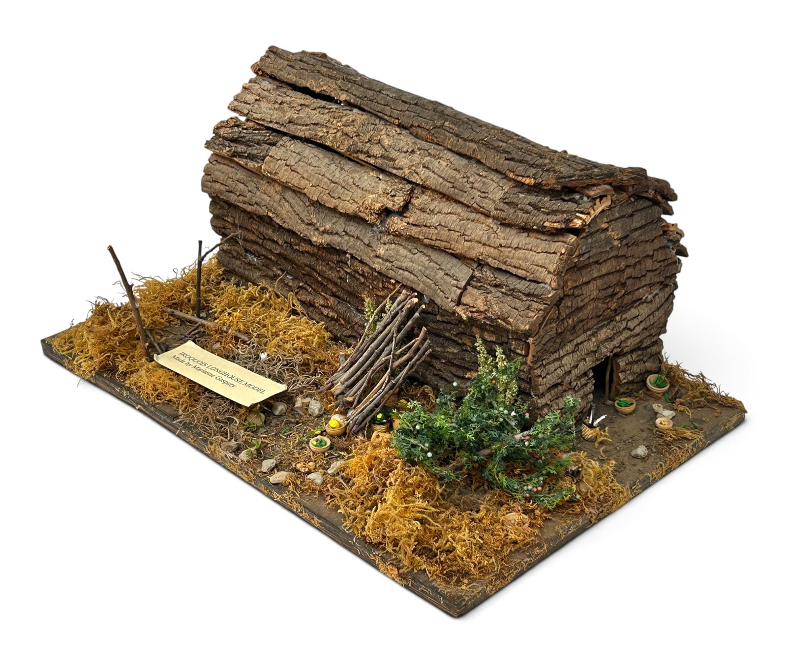 Iroquois Haudenosaunee Diorama Model of Longhouse.: A few pieces need to be reglued, but overall the lot presents well. The dimensions are 24" x 16" x 12". Third-party shipping or personal pickup is required. Please check the "self arranged" button at