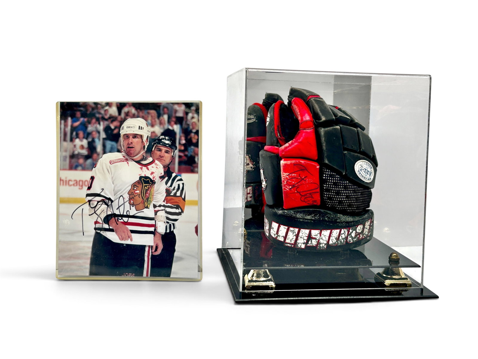 Tony Amonte Autographed NHL Hockey Glove w/ Photo.: The display case is also included. The photo is from when Tony Amonte played for the Chicago Blackhawks. The piece comes with a certificate of authenticity from a Charity authentication service. It is