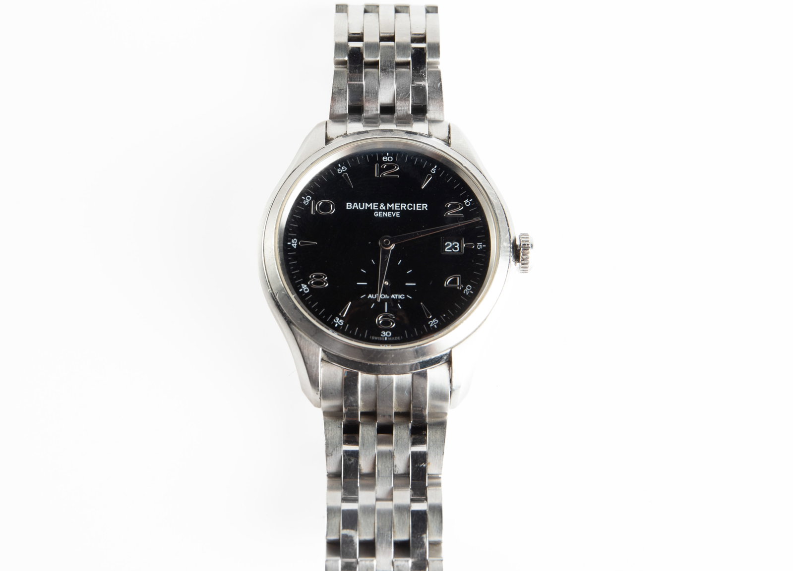 Baume & Mercier Clifton Automatic Date Watch.: The watch is model number 65717. It has a black dial and a skeleton back. It has the original branded stainless steel band. The case measures 41mm in diameter, and the band is currently set at 7 1/2" 