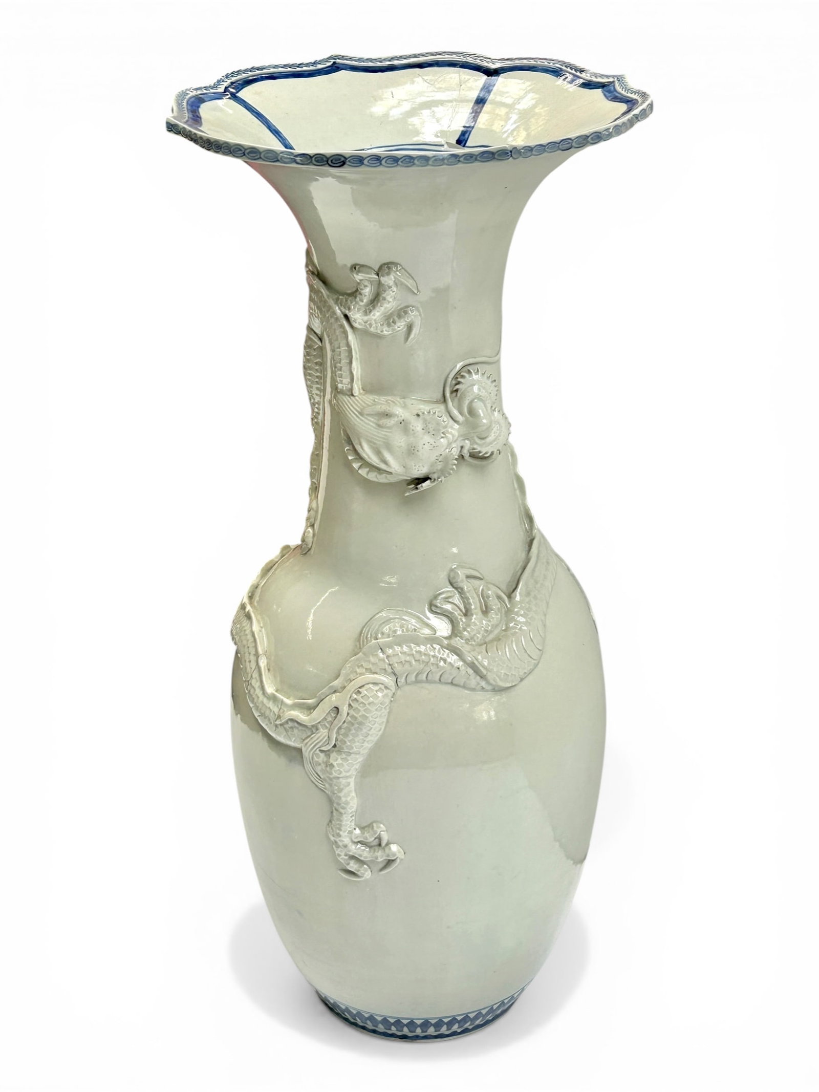 Large Arita Blue & White Dragon Vase, Repaired.: The repair on this Japanese porcelain vase is near the rim of the vase. There is also an area on the side of the vase that looks like it has a repair. The vase measures 30" tall and 13" in diameter at