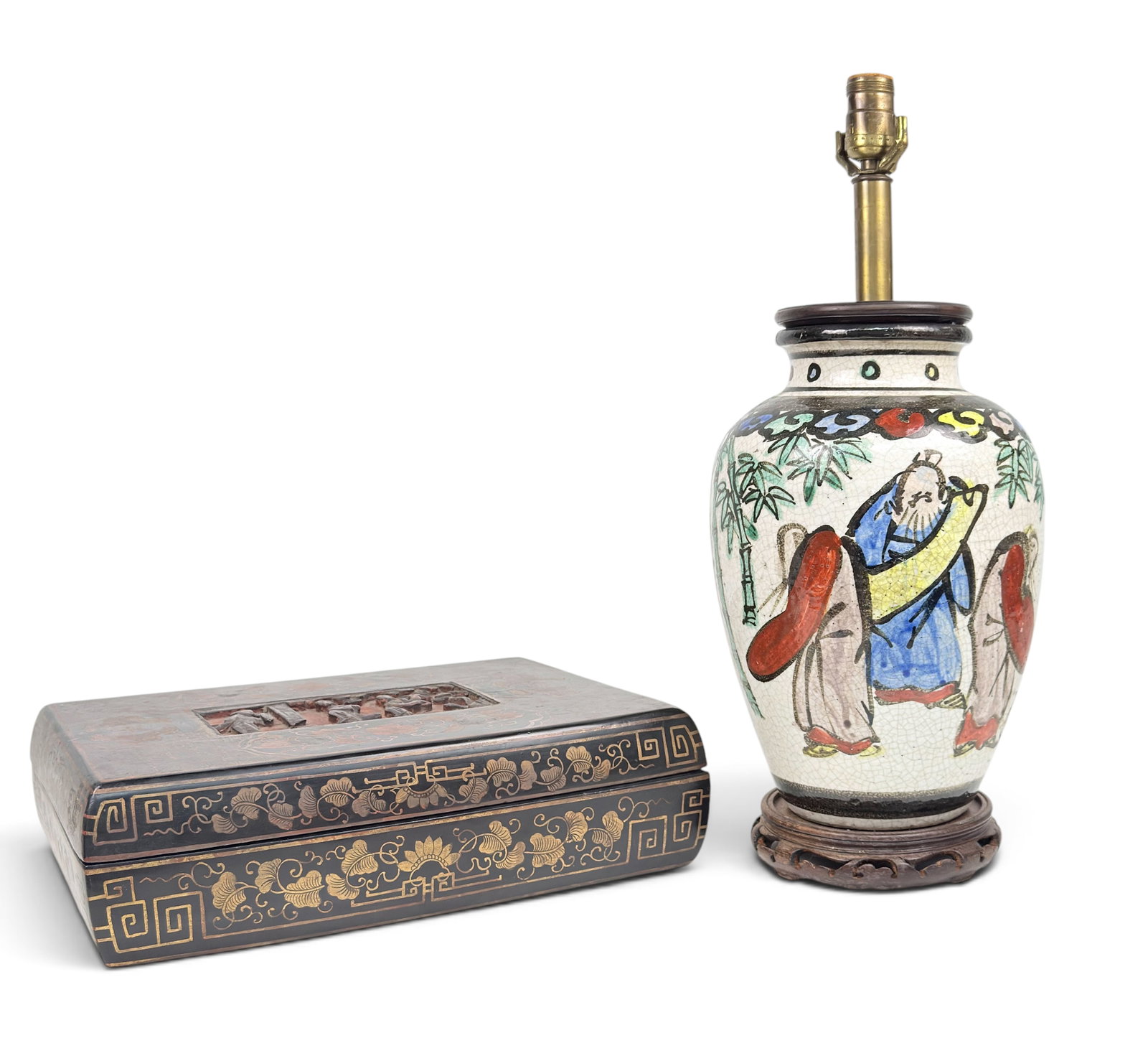 Lot 20th Cent. Chinese Items - Lacquer Box & Lamp.: The lot contains a black lacquer box and a handpainted heavy ceramic vase lamp on a carved wood stand. The box measures 4 1/2" tall, 15 3/4" wide, and 10 3/8" deep. The lamp measures 20 3/4" tall and 