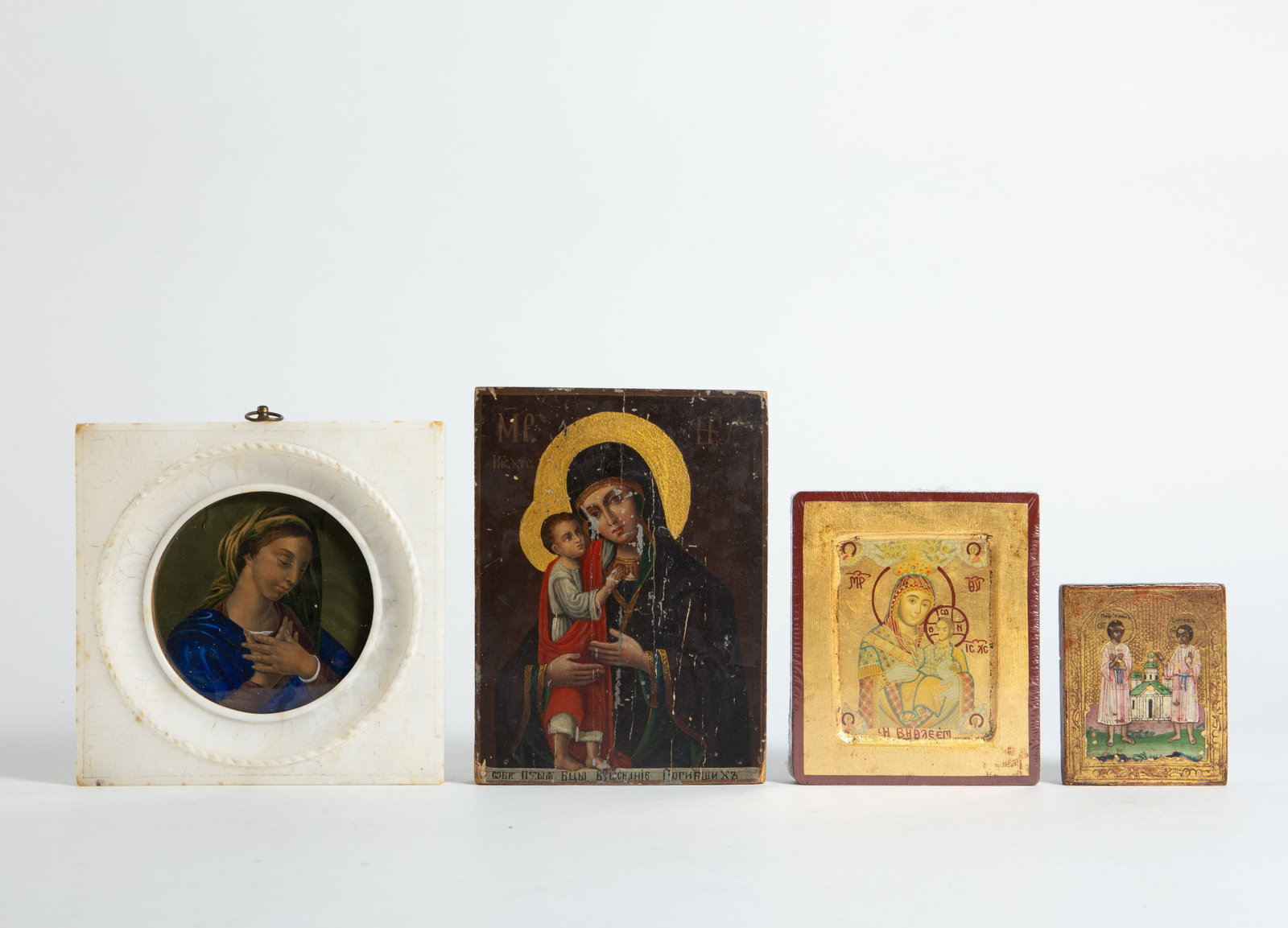 Lot of Miniature Icons, Portrait w/ Marble Frame.: The image of the Virgin Mary is housed in an alabaster possibly marble frame. The other three items are small replicas of religious icons, in nice condition. The largest item in the lot measures 6